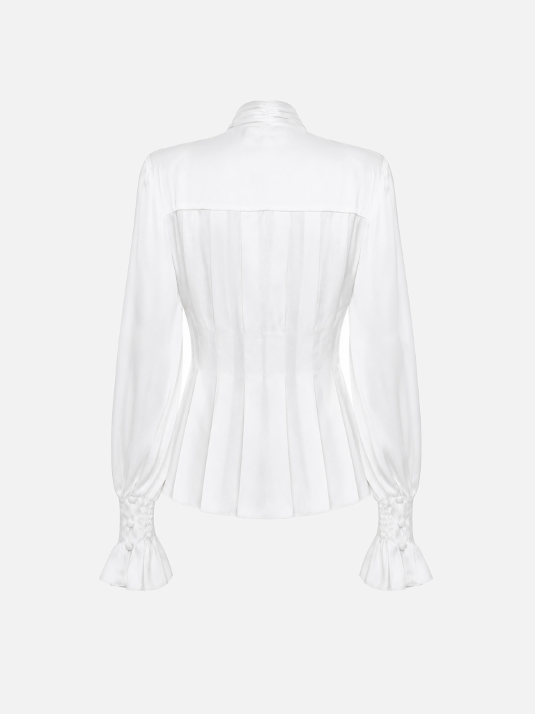Blouse with a bow at the collar and large pleats