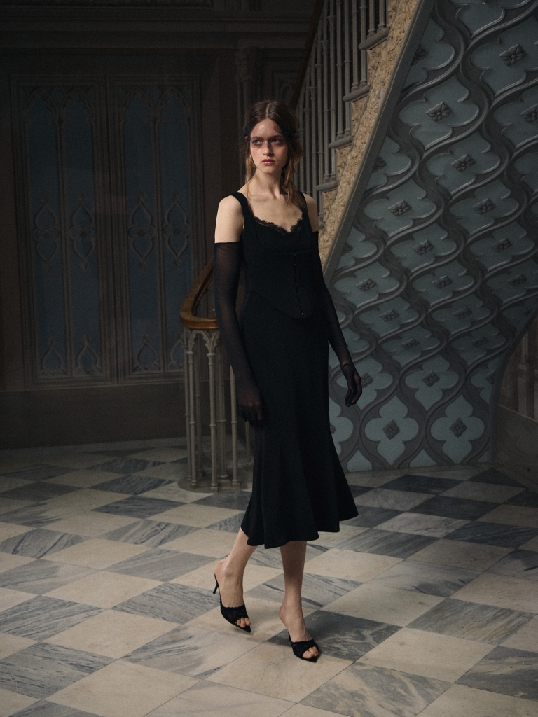 Midi dress with wide straps and a corset-style insert at the waist