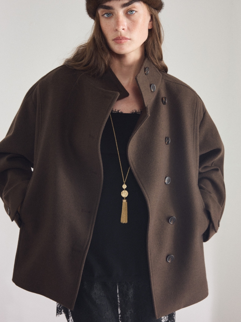 Short coat with button fastening and a matching belt