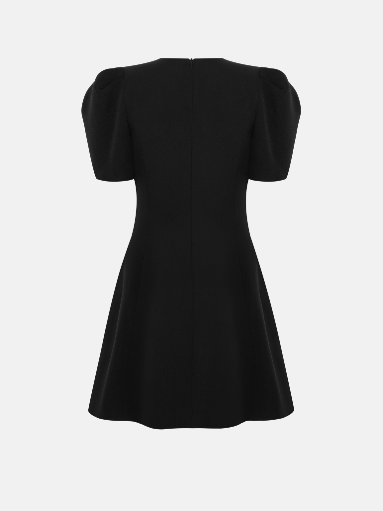 Mini dress with a bow at the waist and a voluminous skirt