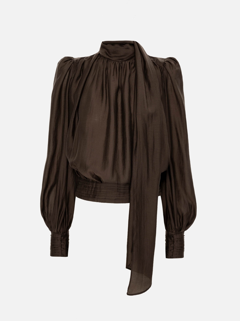 Voluminous blouse with draping at the waist and a ribbon scarf