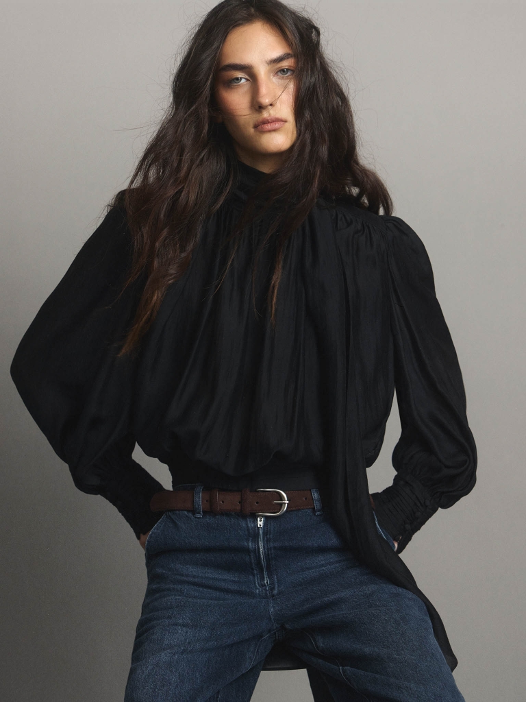 Voluminous blouse with draping at the waist and a ribbon scarf