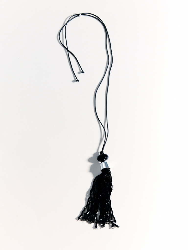 Cord necklace with a beaded tassel