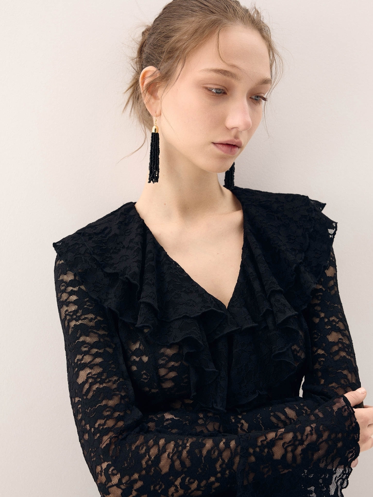 Golden earrings with beaded tassels
