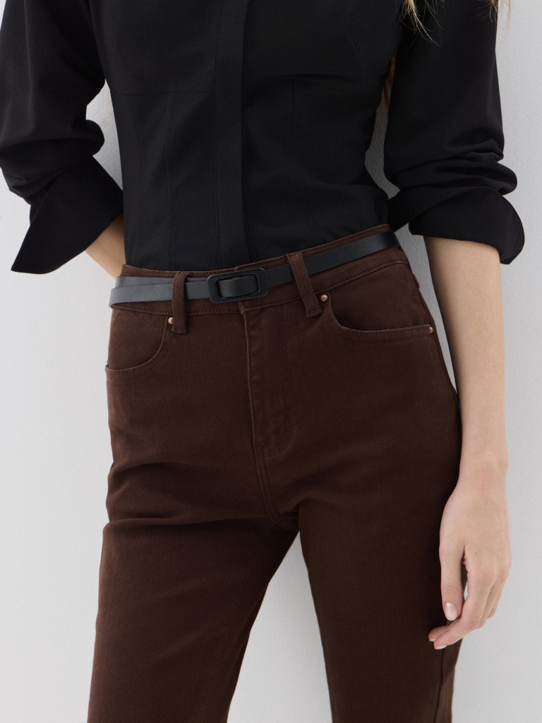 Thin eco-leather belt with a matching buckle