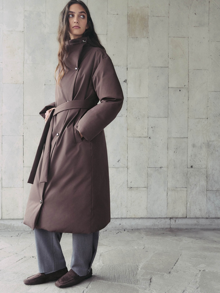 Midi puffer jacket with an asymmetrical fastening