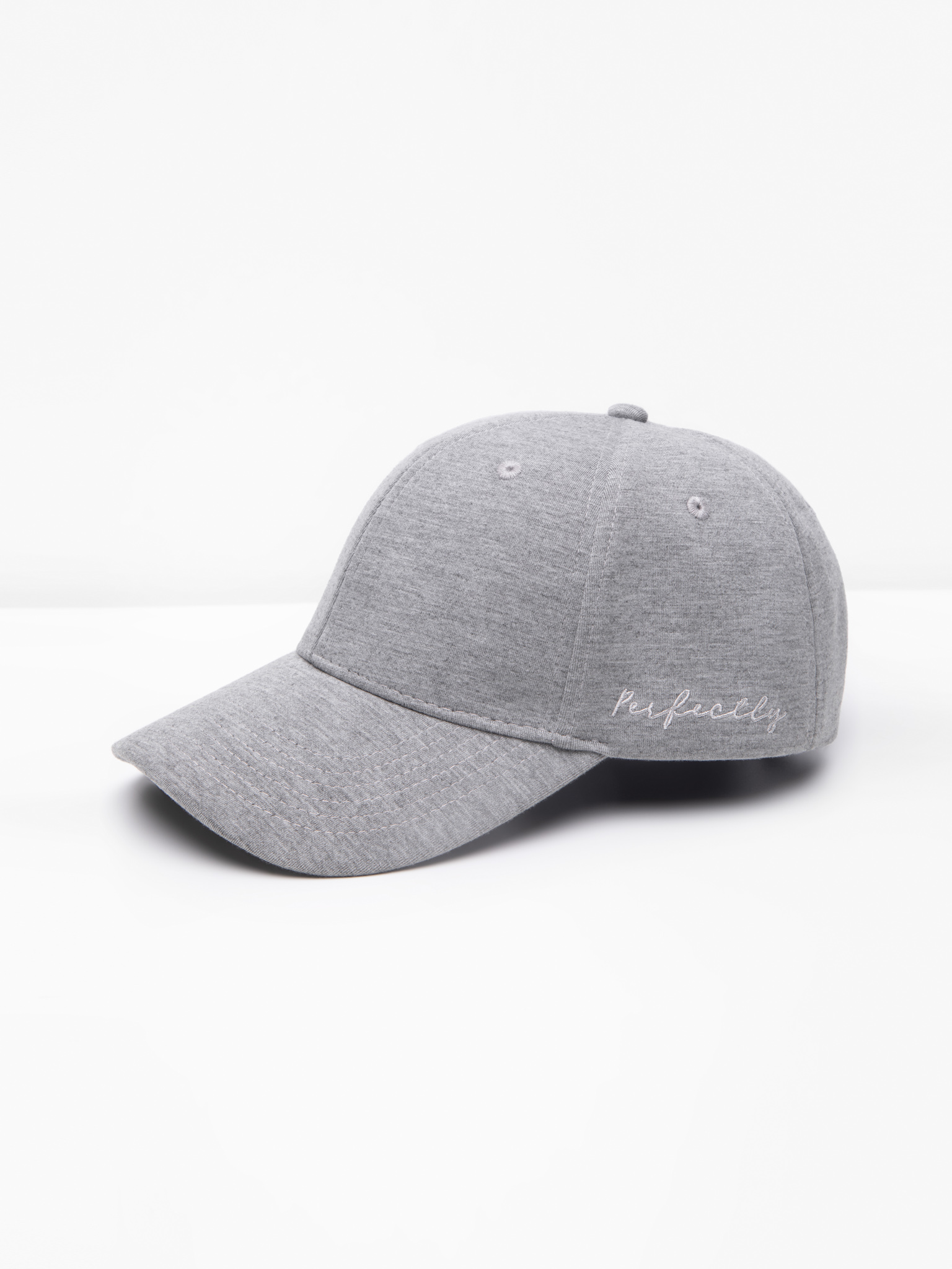 Cap with embroidery on the side