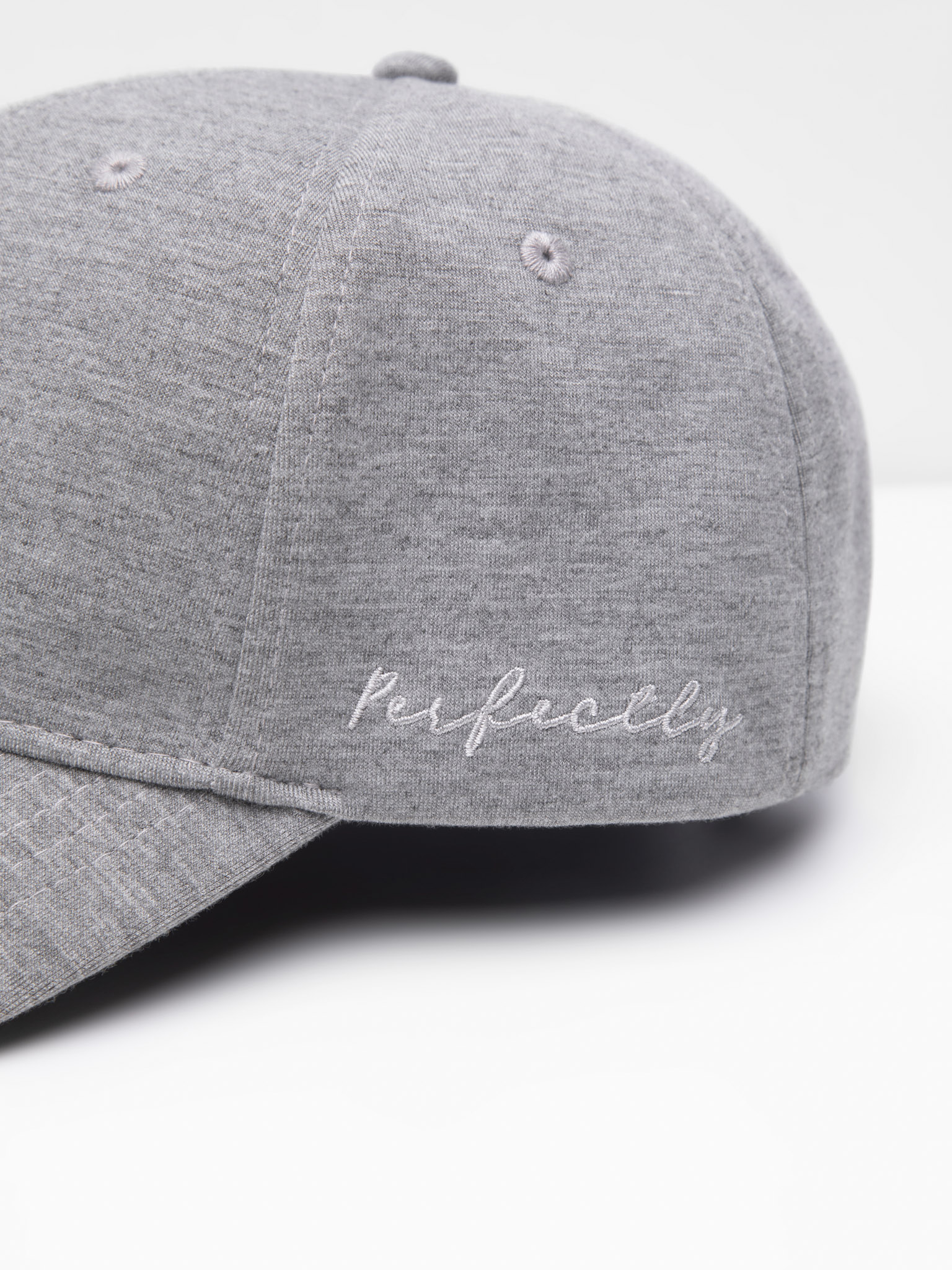 Cap with embroidery on the side