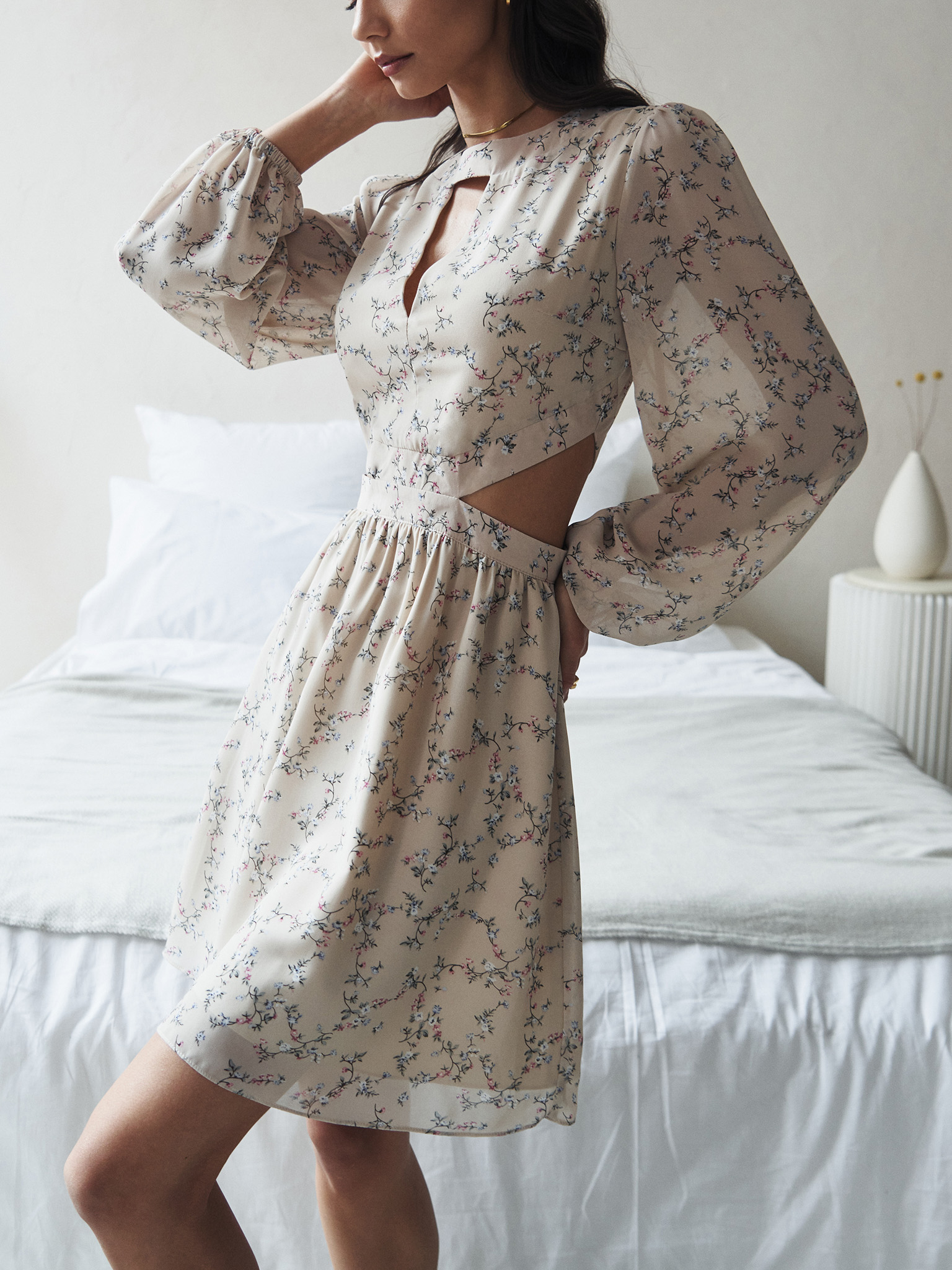 Mini dress from flowing fabric with waist and collar cutouts