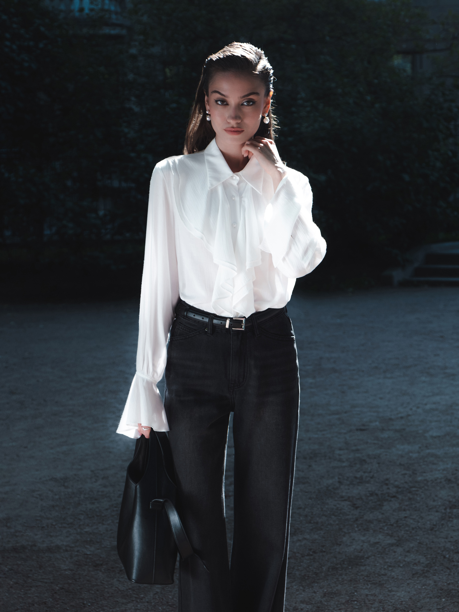 Blouse with voluminous flounces and button fastening