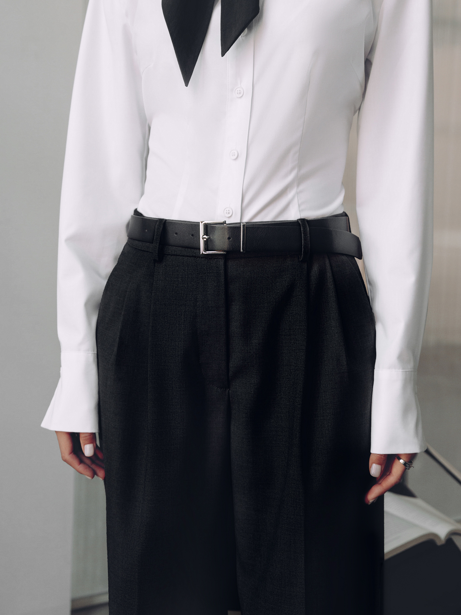 Trousers with a wide eco-leather belt