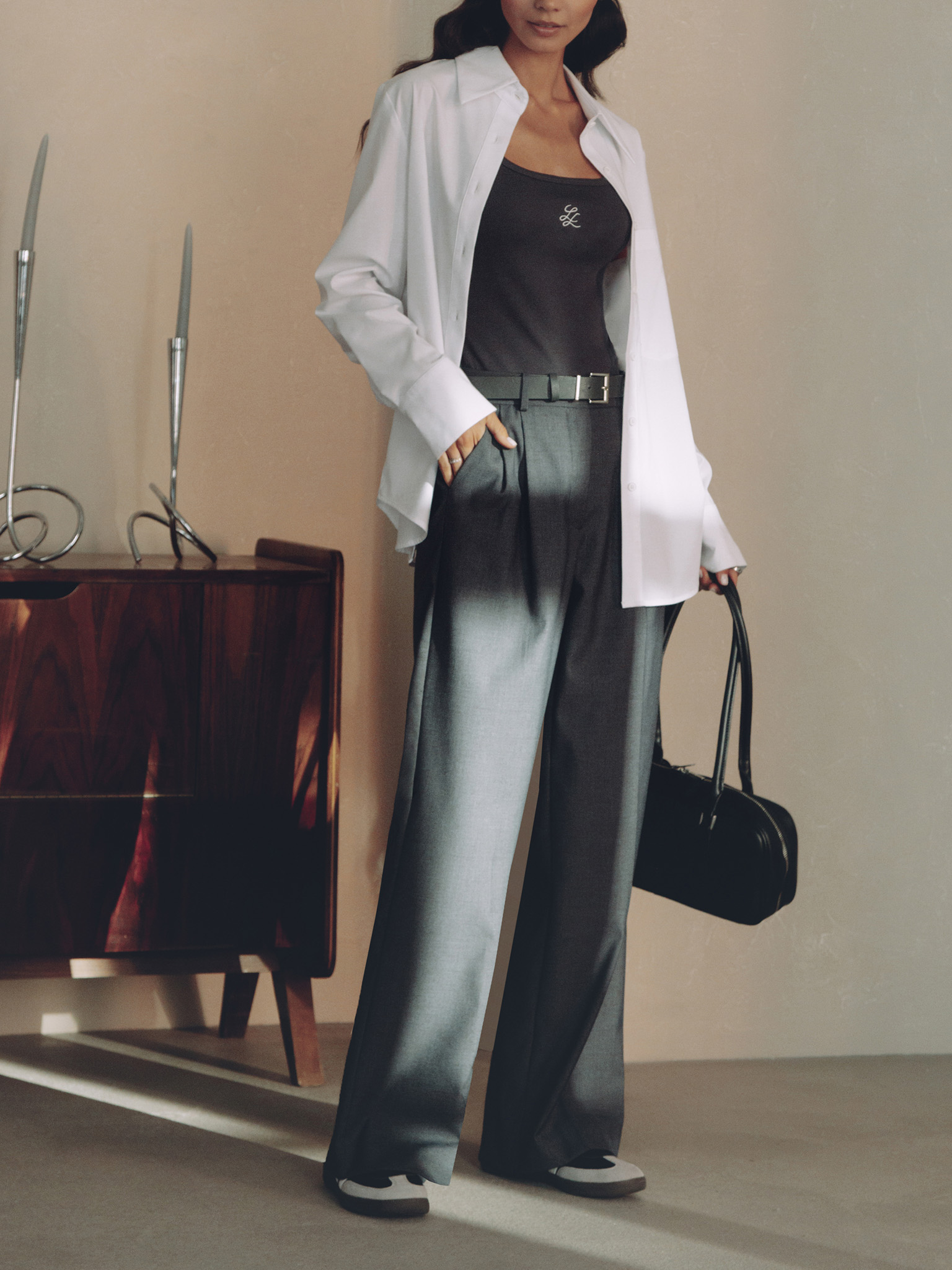 Trousers with a wide eco-leather belt