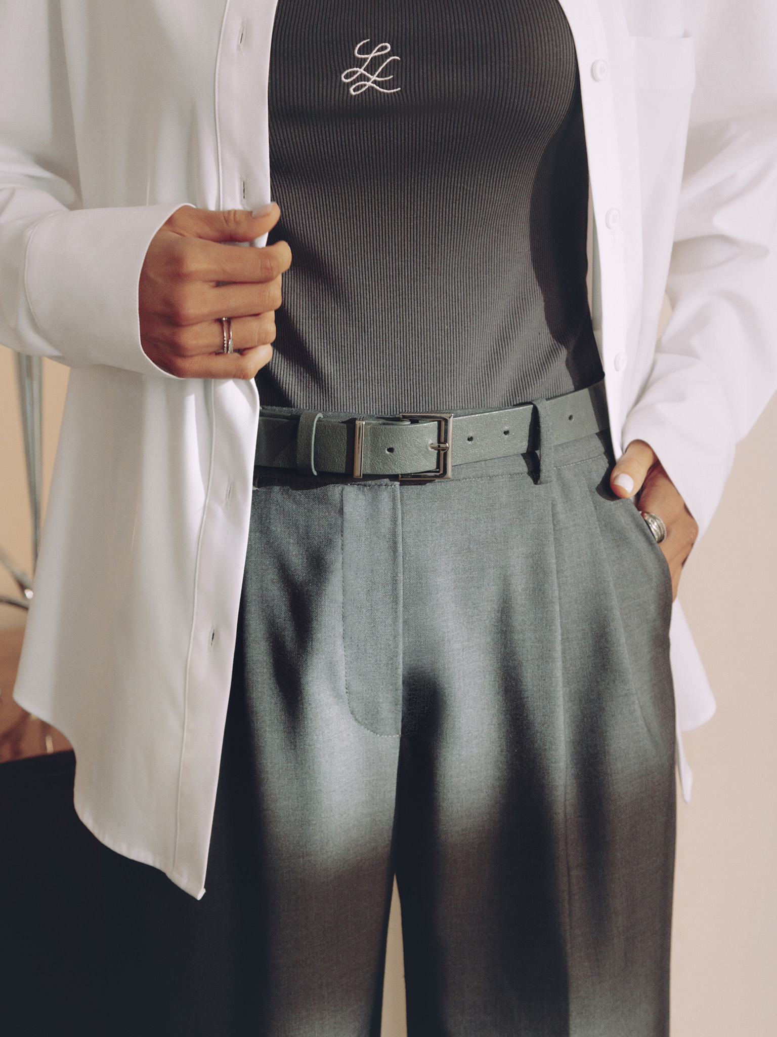 Trousers with a wide eco-leather belt