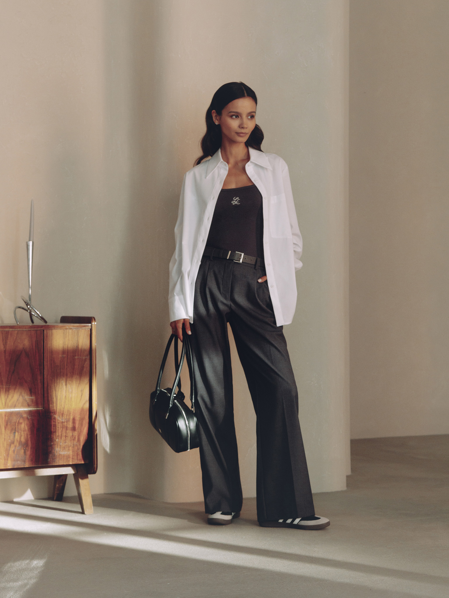 Trousers with a wide eco-leather belt