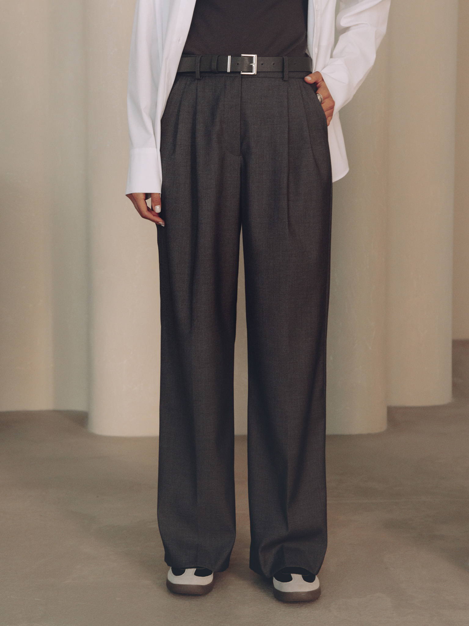 Trousers with a wide eco-leather belt