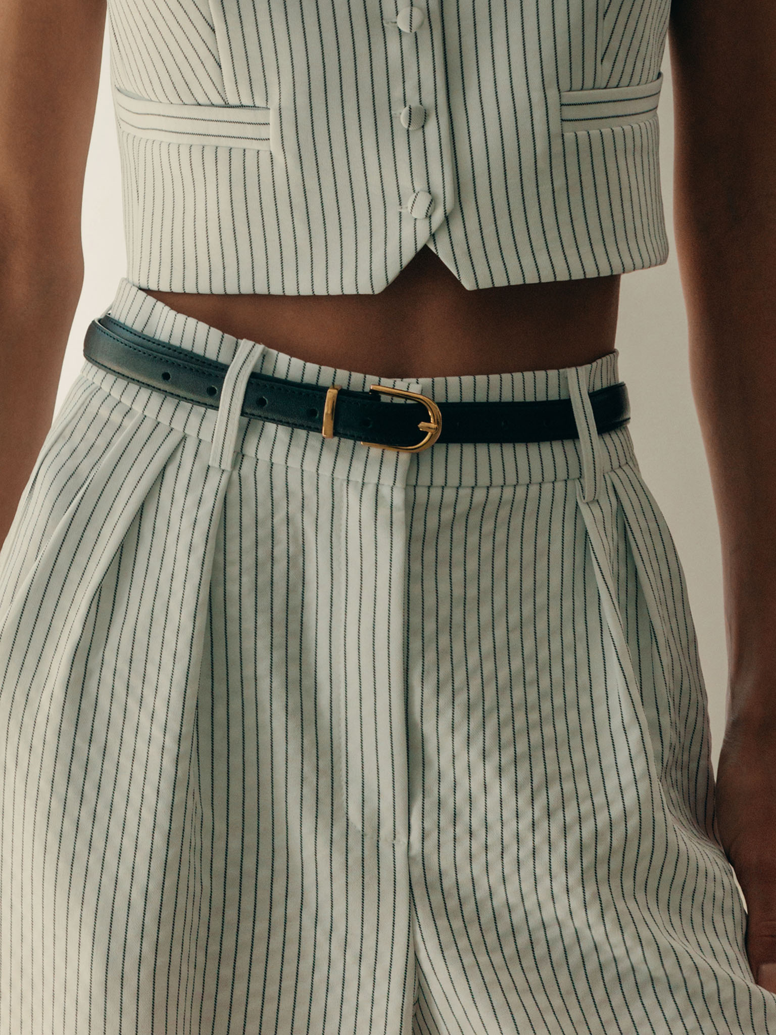 Slim leather belt with golden buckle