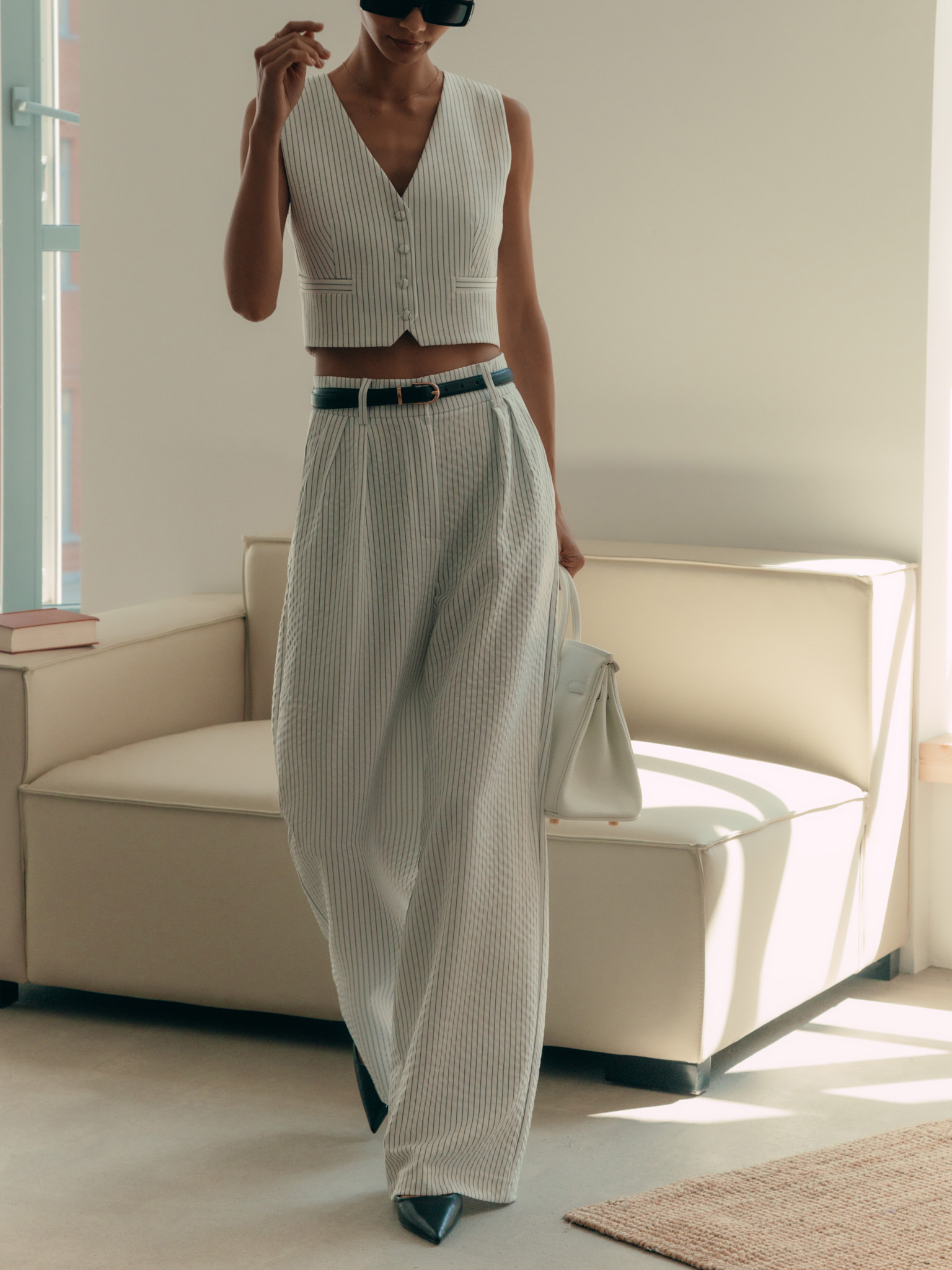 Thin-striped trousers with waist pleats
