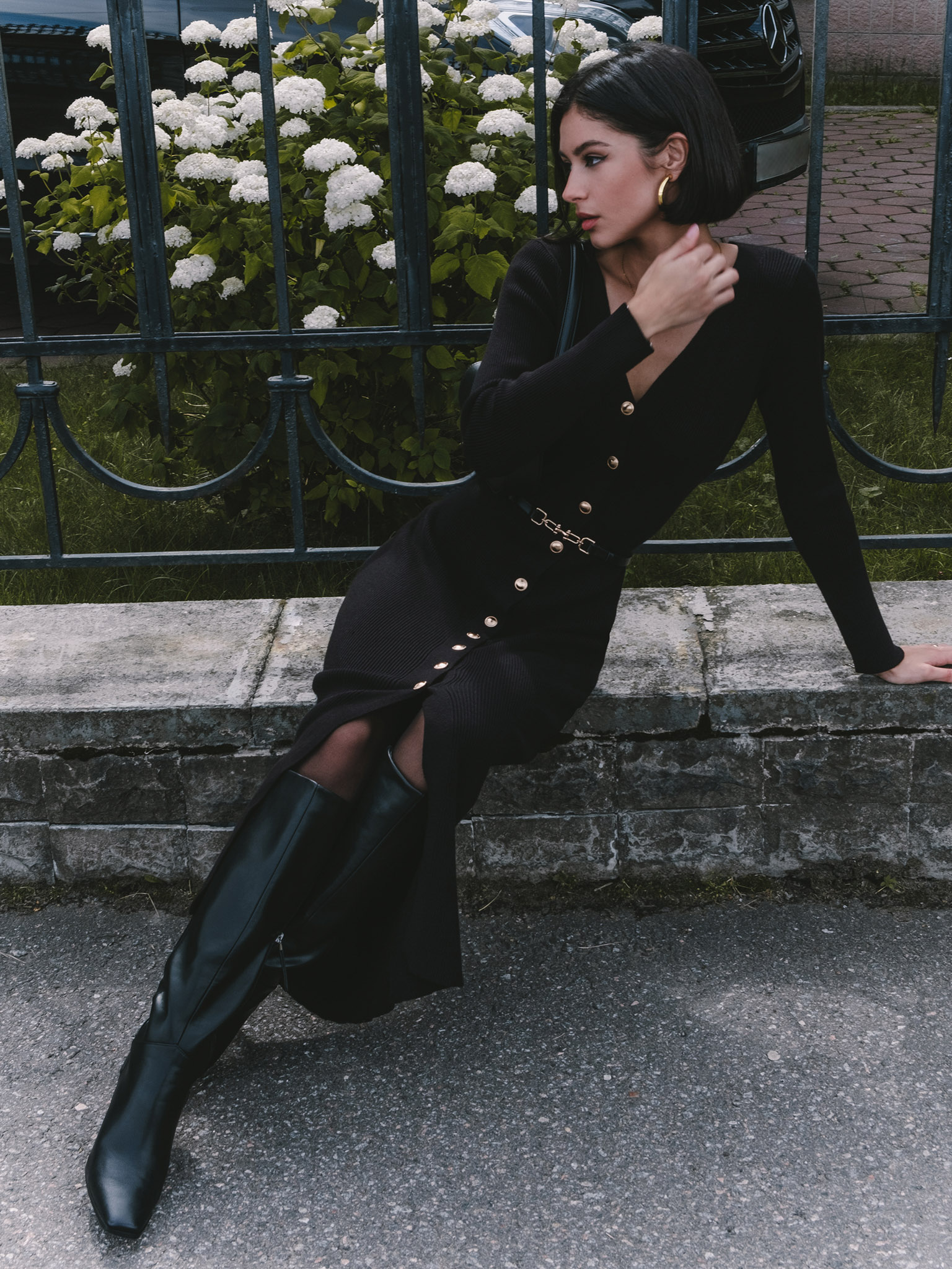 Knitted midi dress with a belt and golden decorations