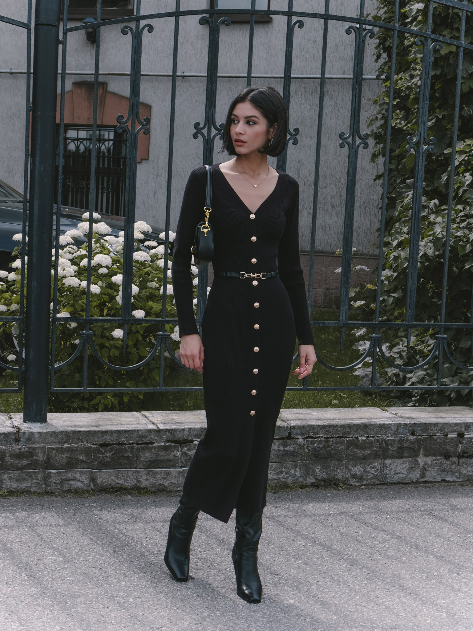 Knitted midi dress with a belt and golden decorations