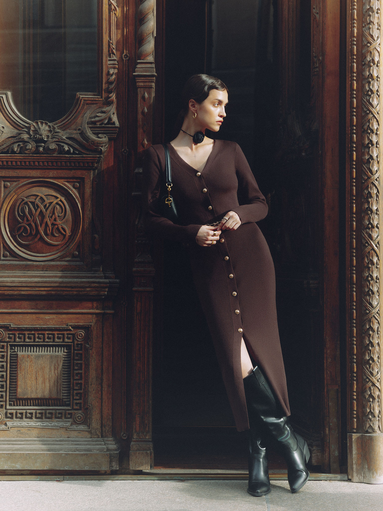 Knitted midi dress with a belt and golden decorations