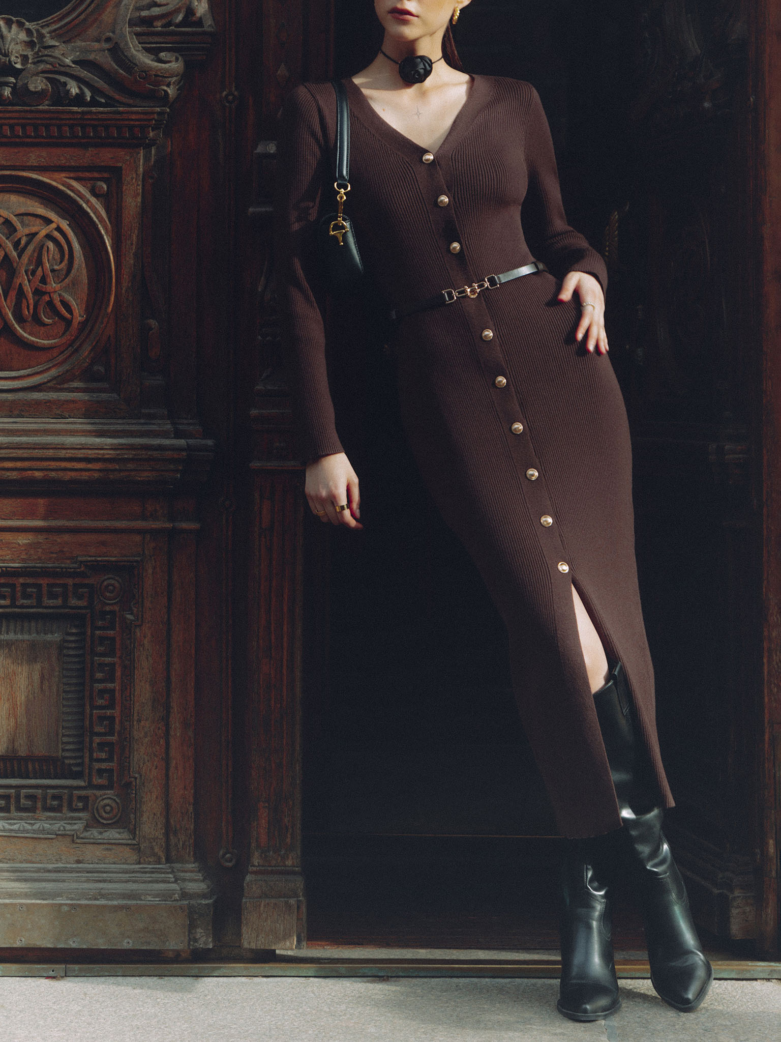 Knitted midi dress with a belt and golden decorations