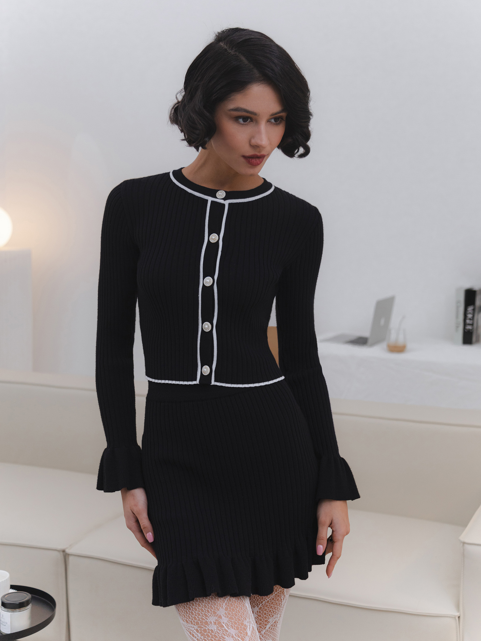 Rib-knit cardigan with cuff flounces