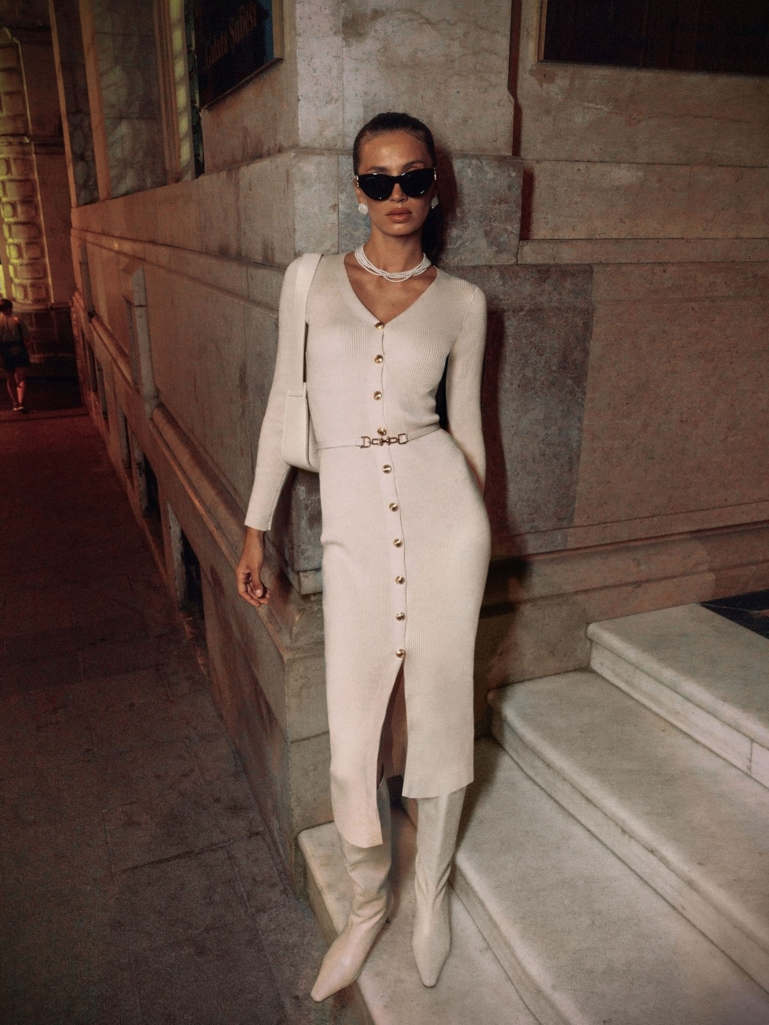 Knitted midi dress with a belt and golden decorations