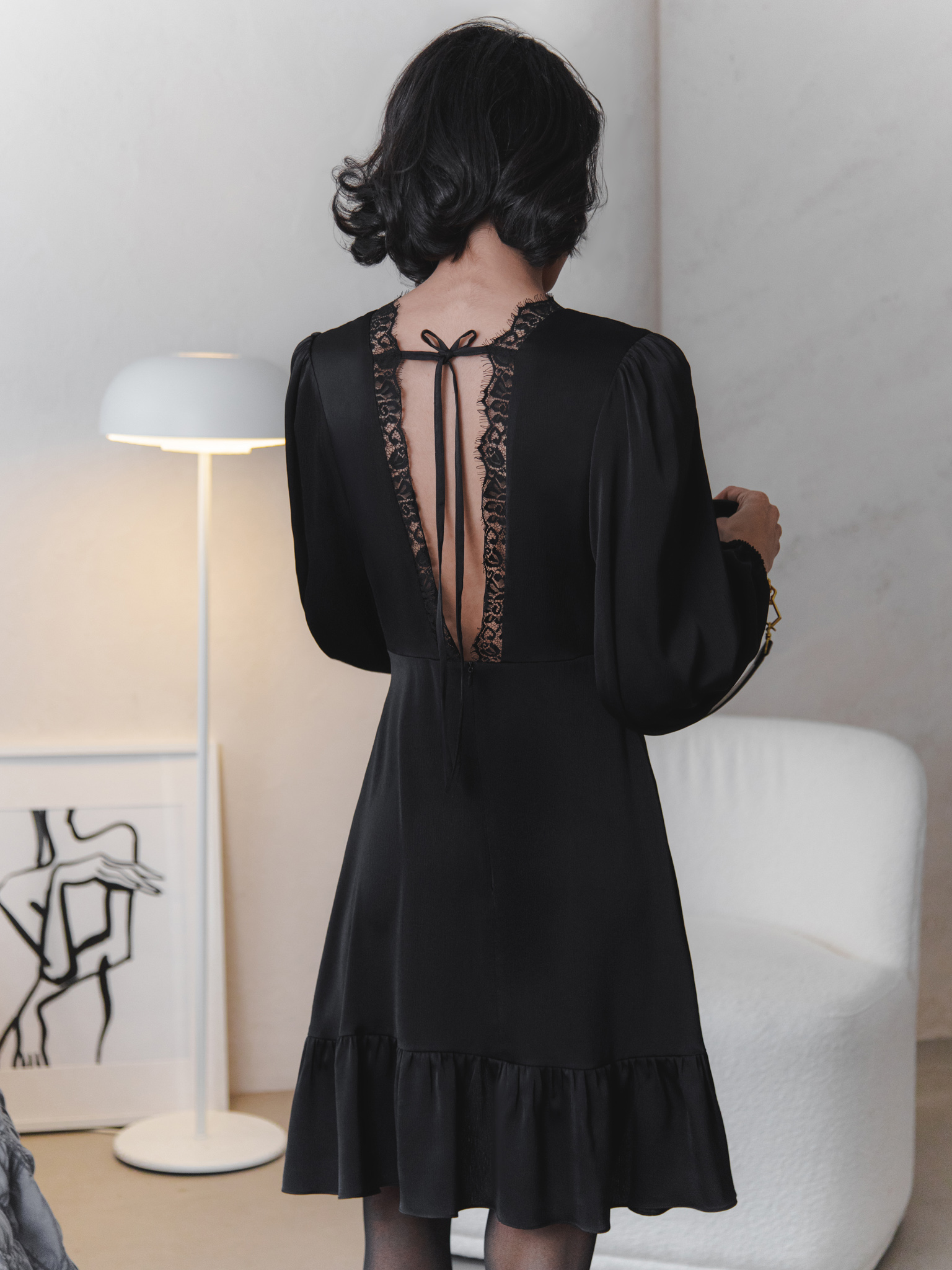 Mini dress with lace inserts and back ties