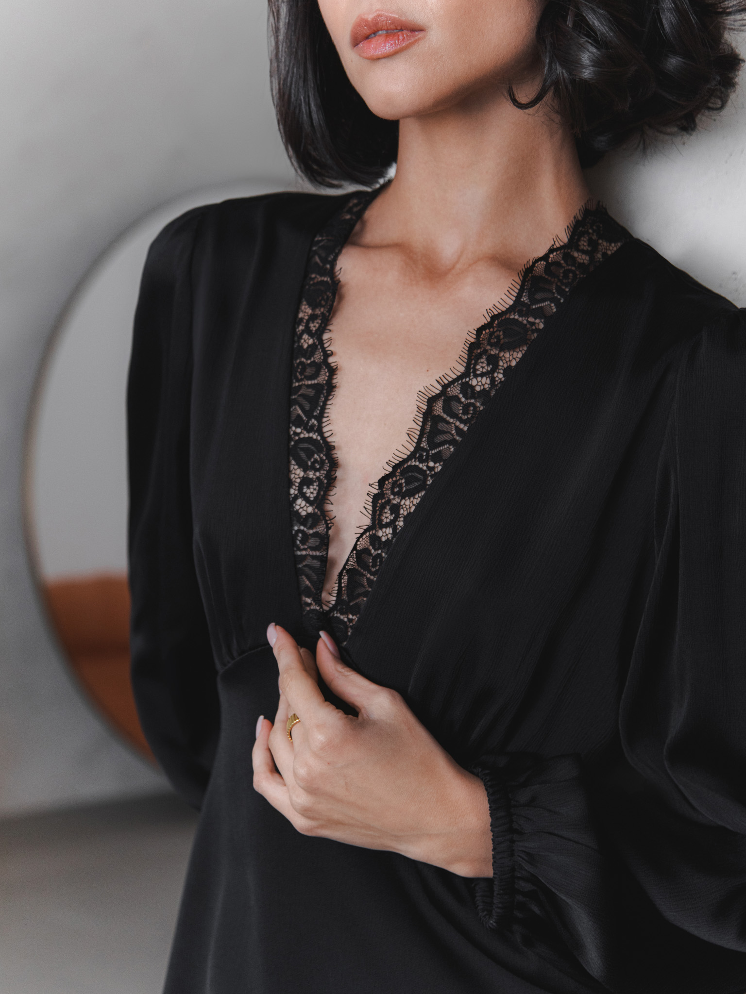 Mini dress with lace inserts and back ties