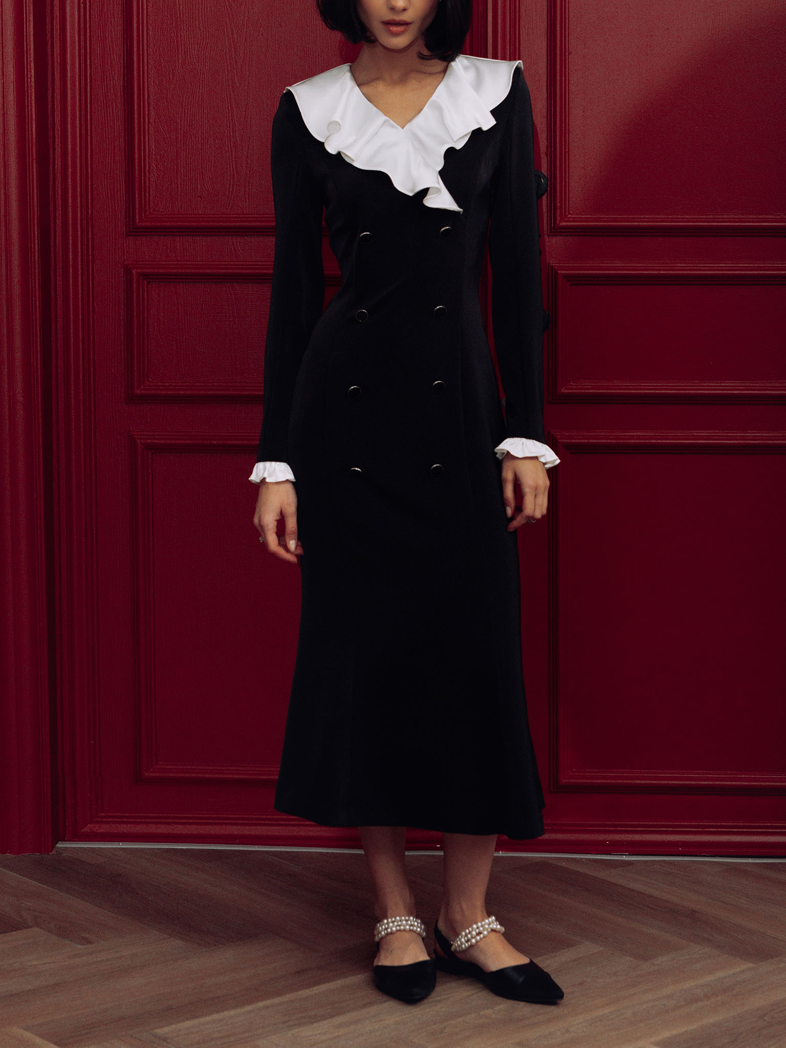 Midi dress with contrasting flounces and button fastening