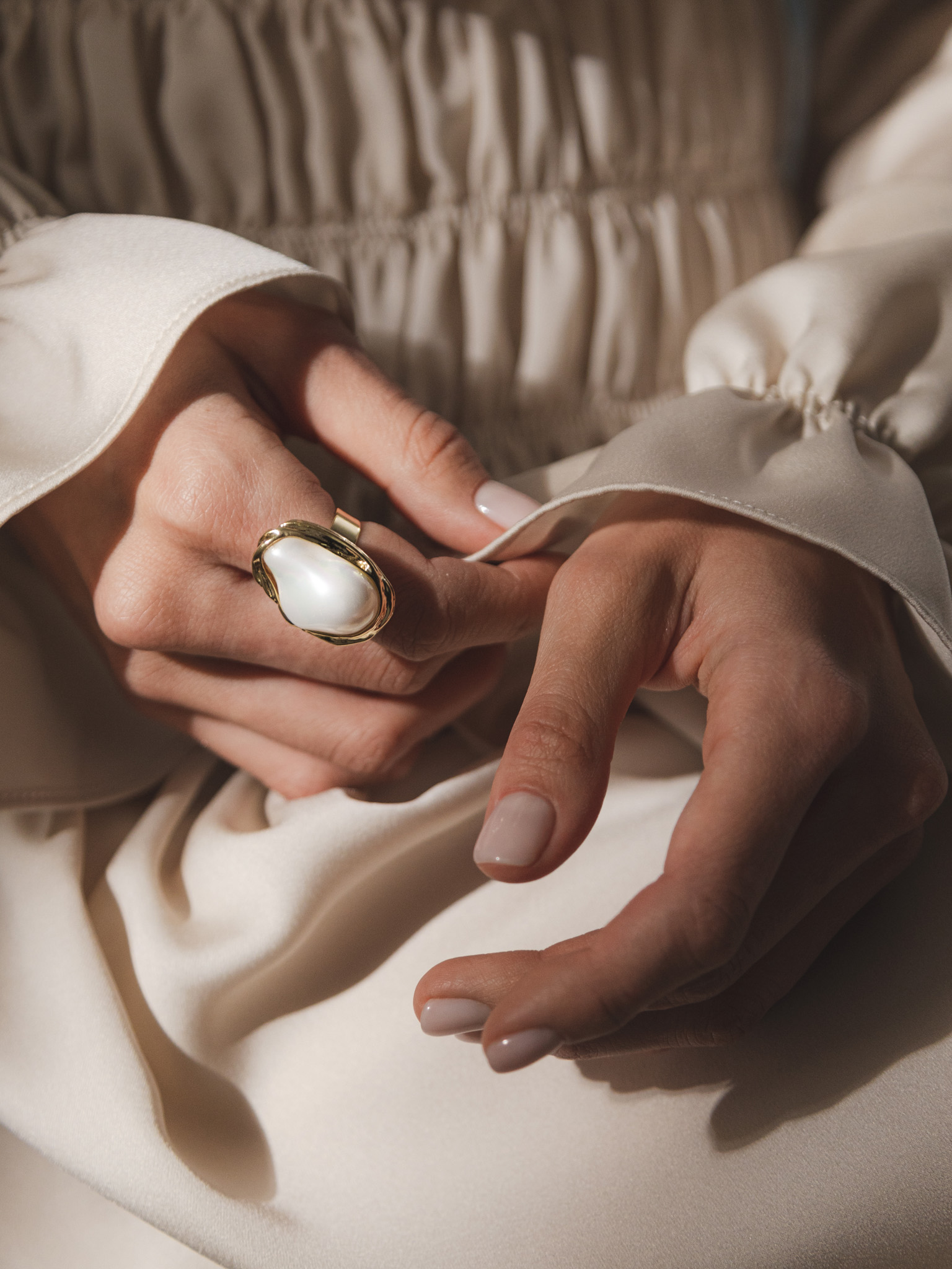 Massive ring with oval stone