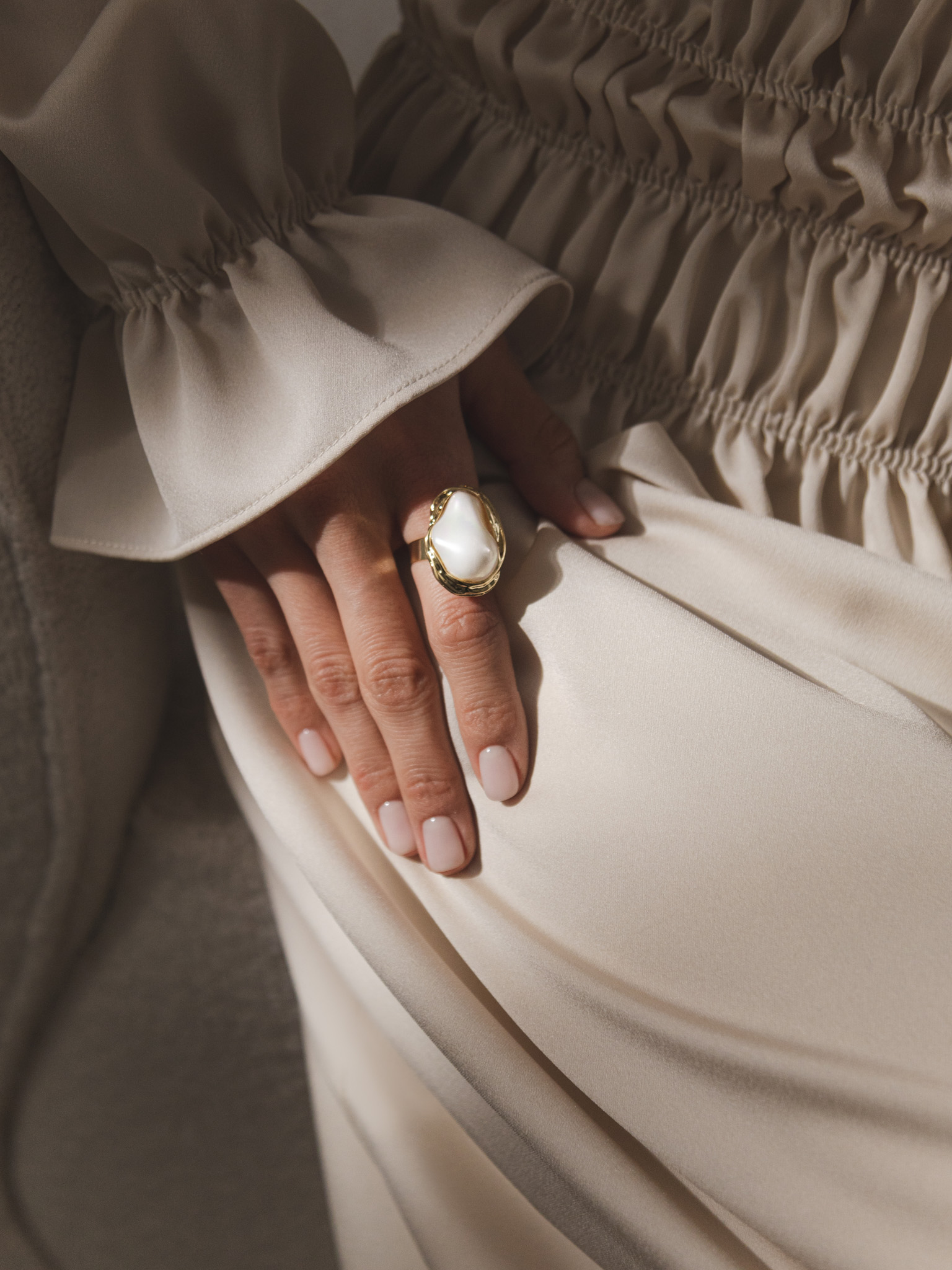 Massive ring with oval stone