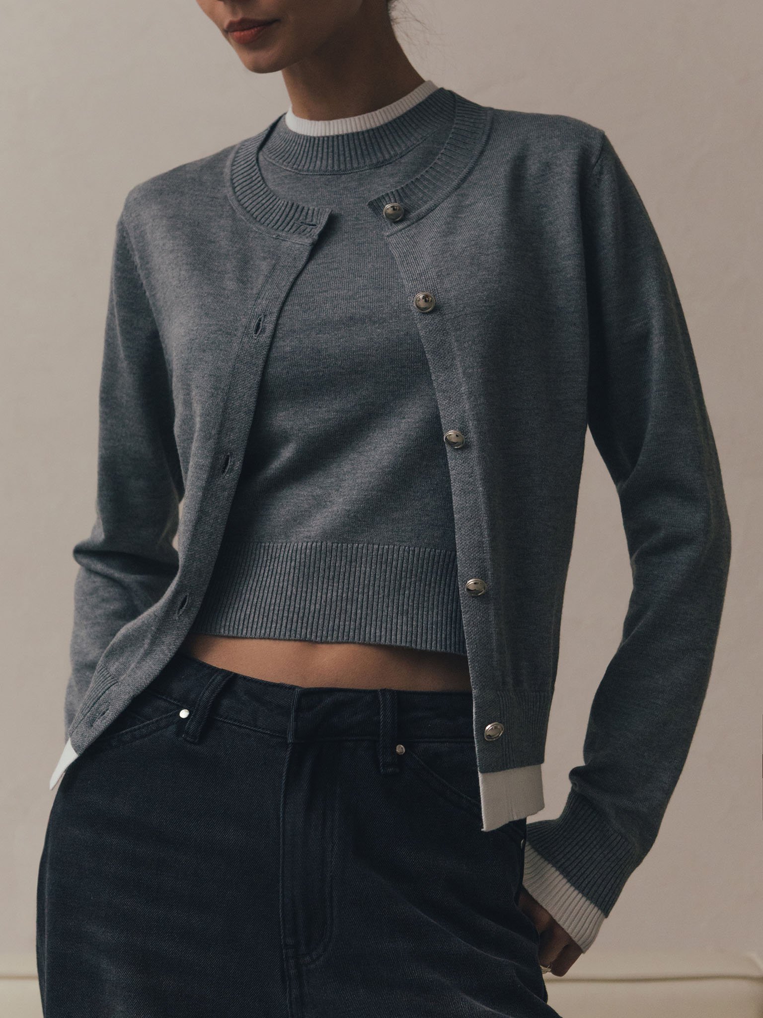 Knitted cardigan with contrasting cuffs and bottom edge