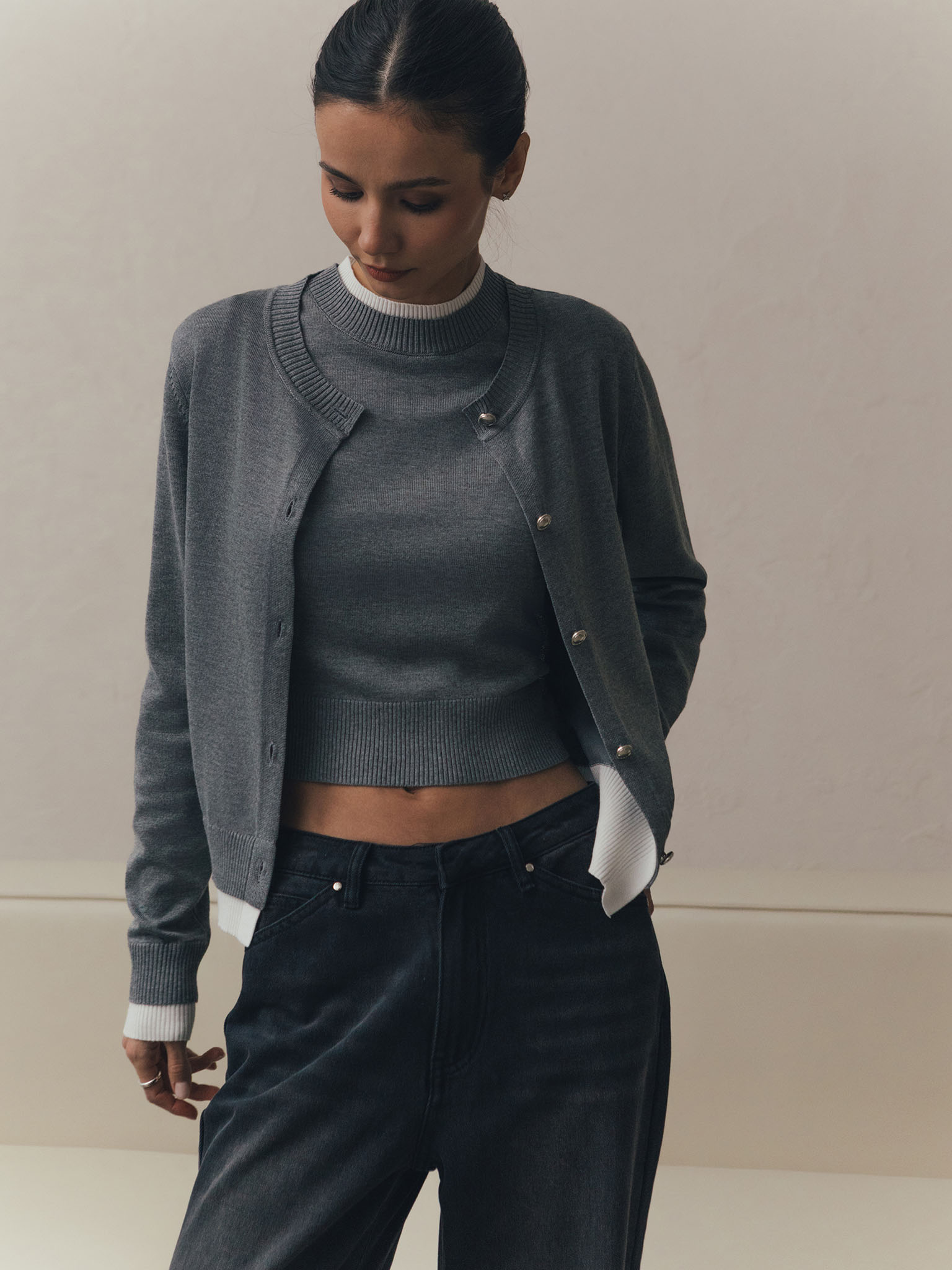 Knitted cardigan with contrasting cuffs and bottom edge