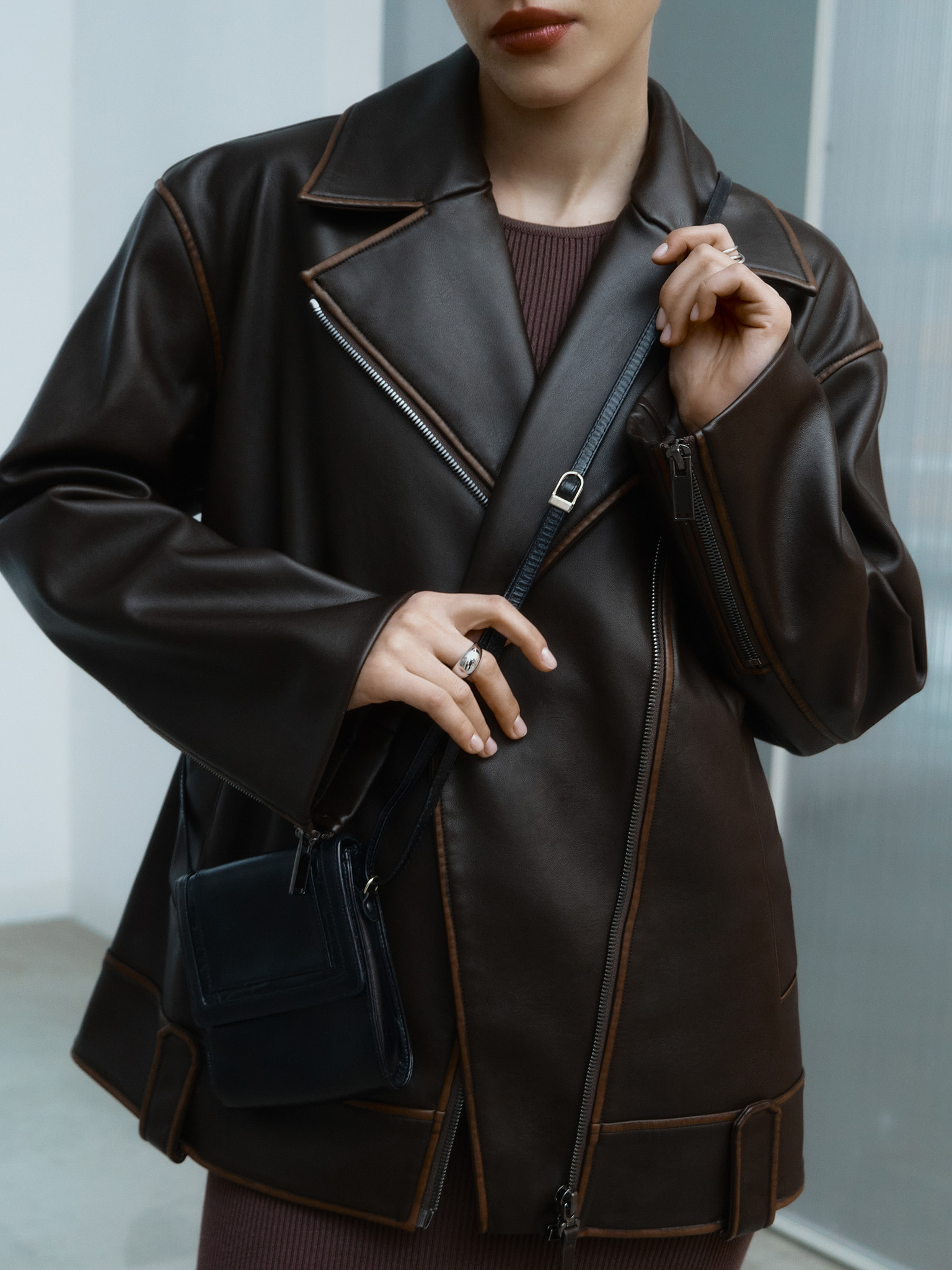 Long eco-leather jacket with zip fastening