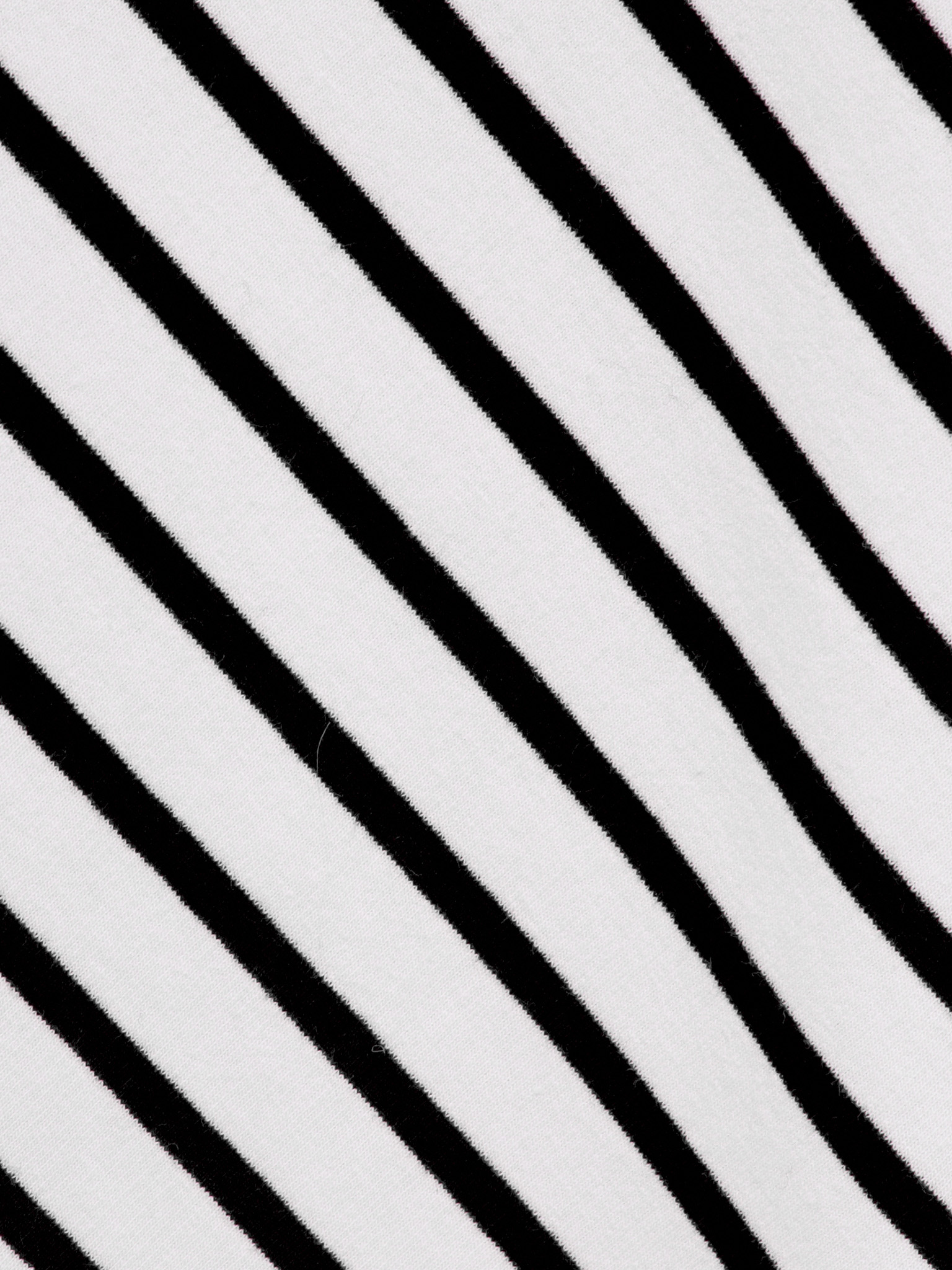 Свободный лонгслив в диагональную полоску