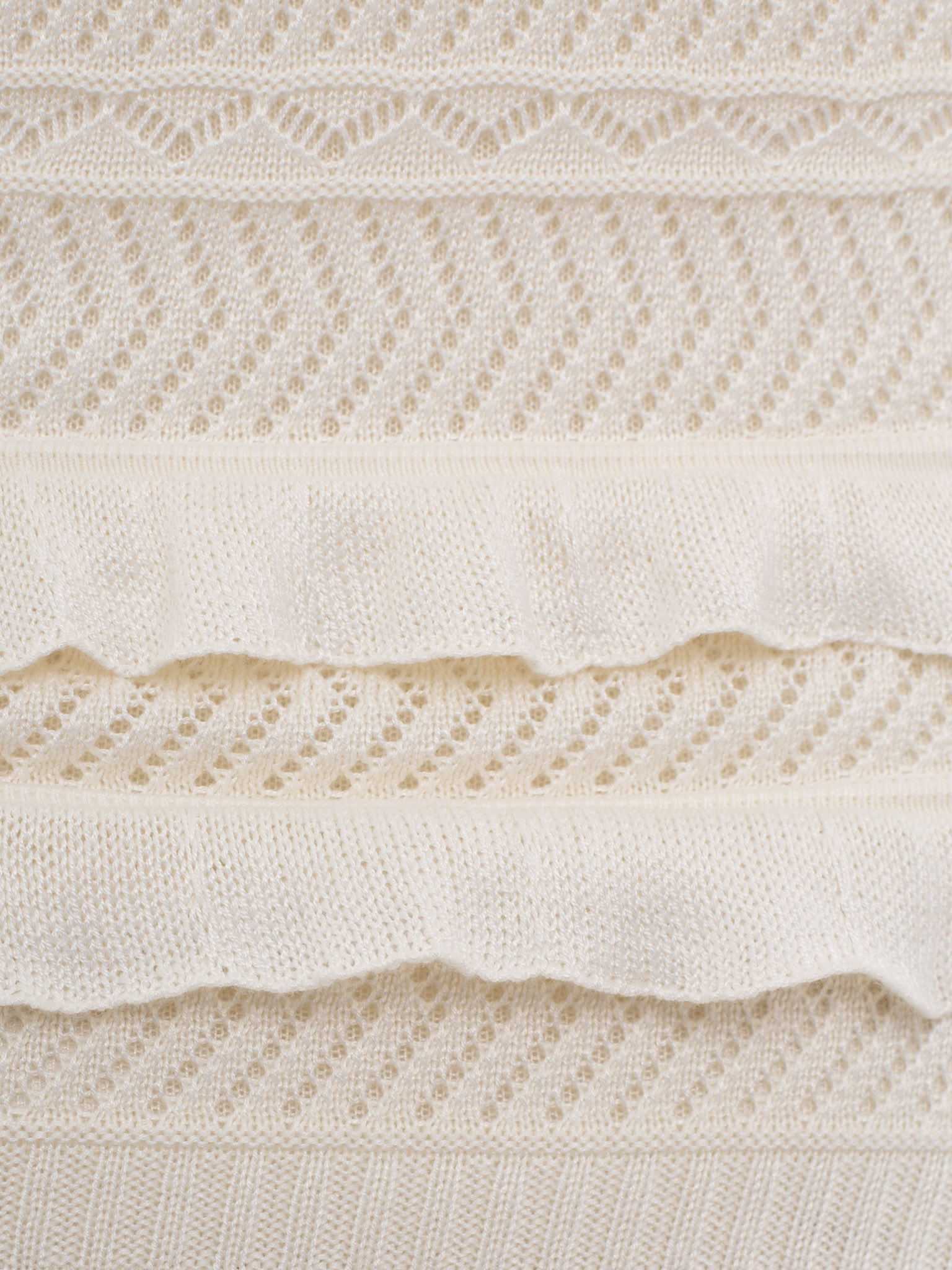 Minikleid aus Strick mit Lochmuster