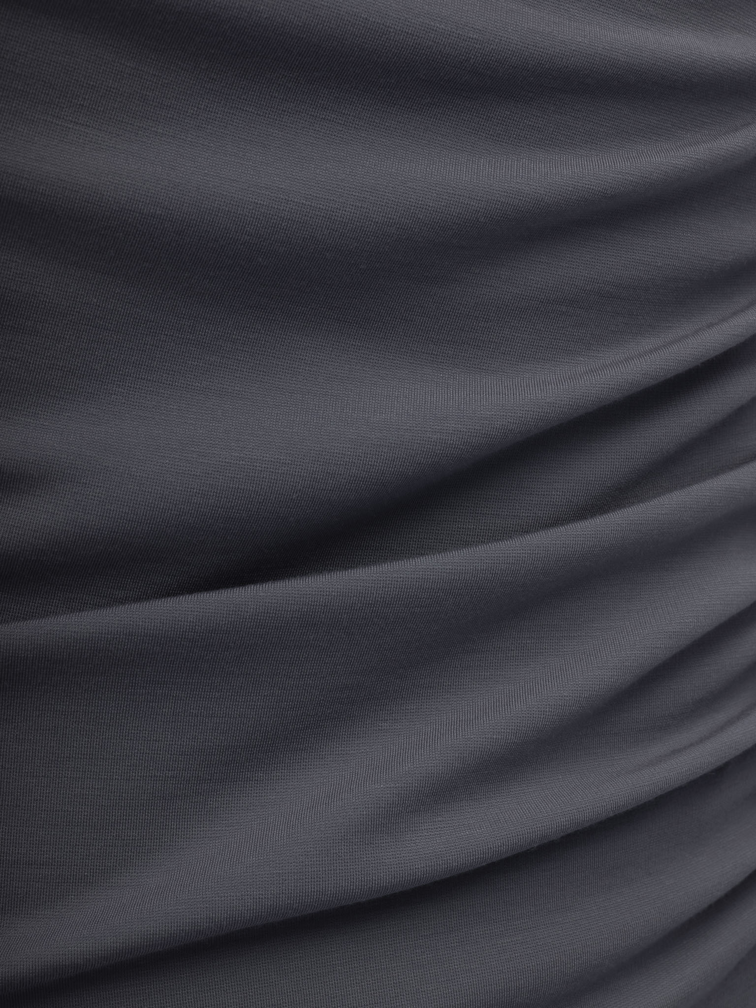 Топ асимметричного кроя с длинными рукавами