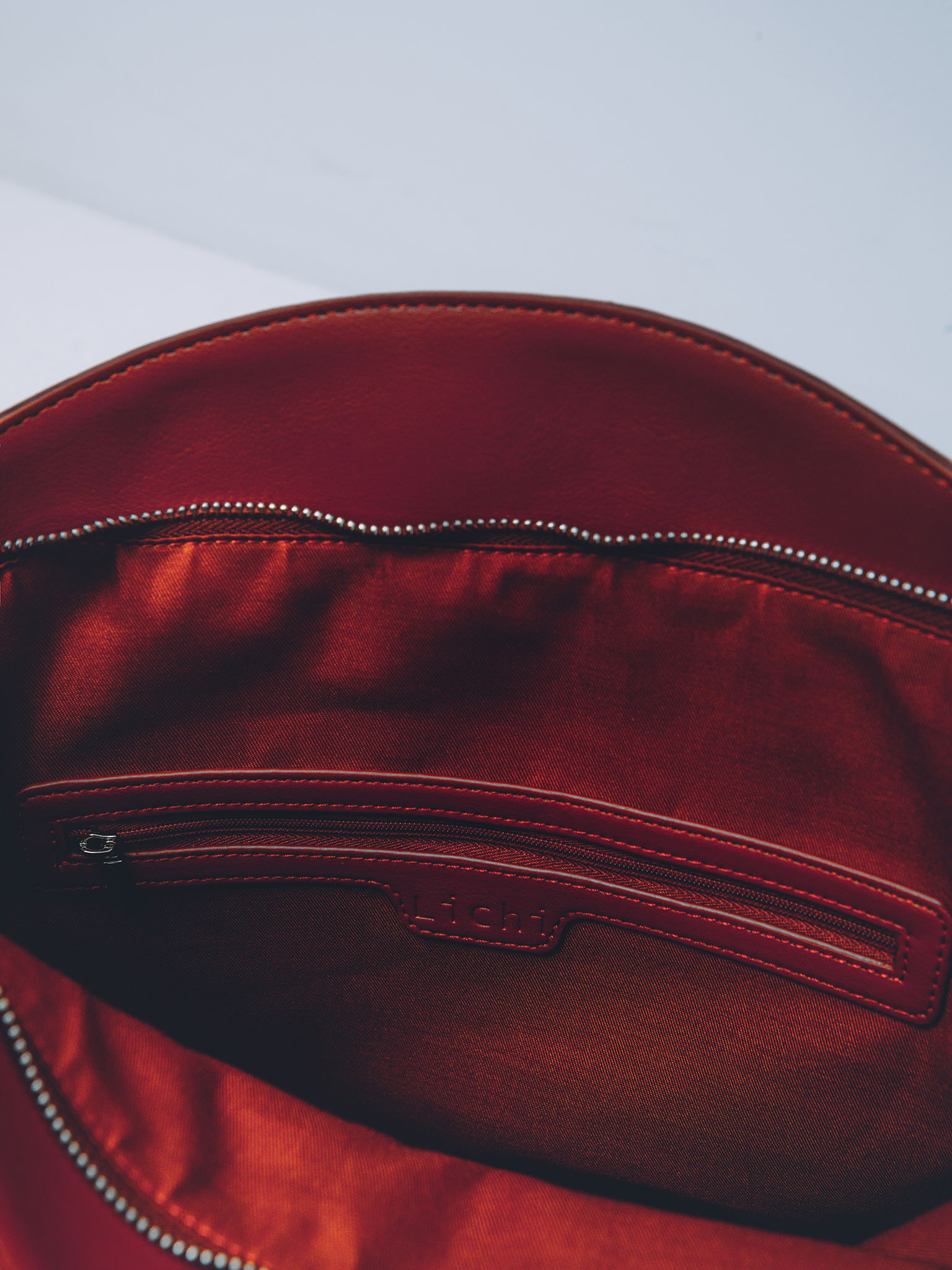 Rectangular eco-leather bag with metal decor