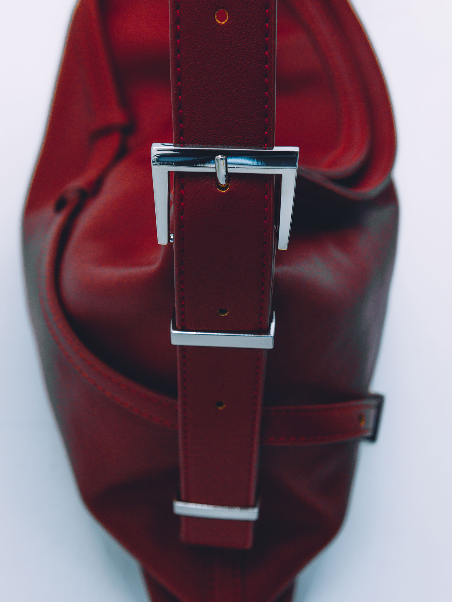 Rectangular eco-leather bag with metal decor