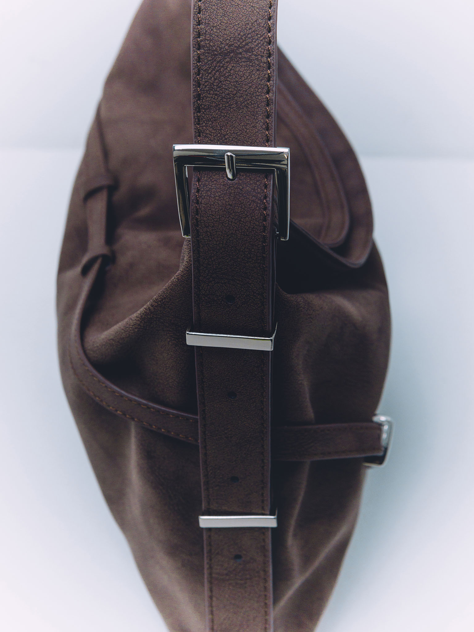 Rectangular eco-leather bag with metal decor