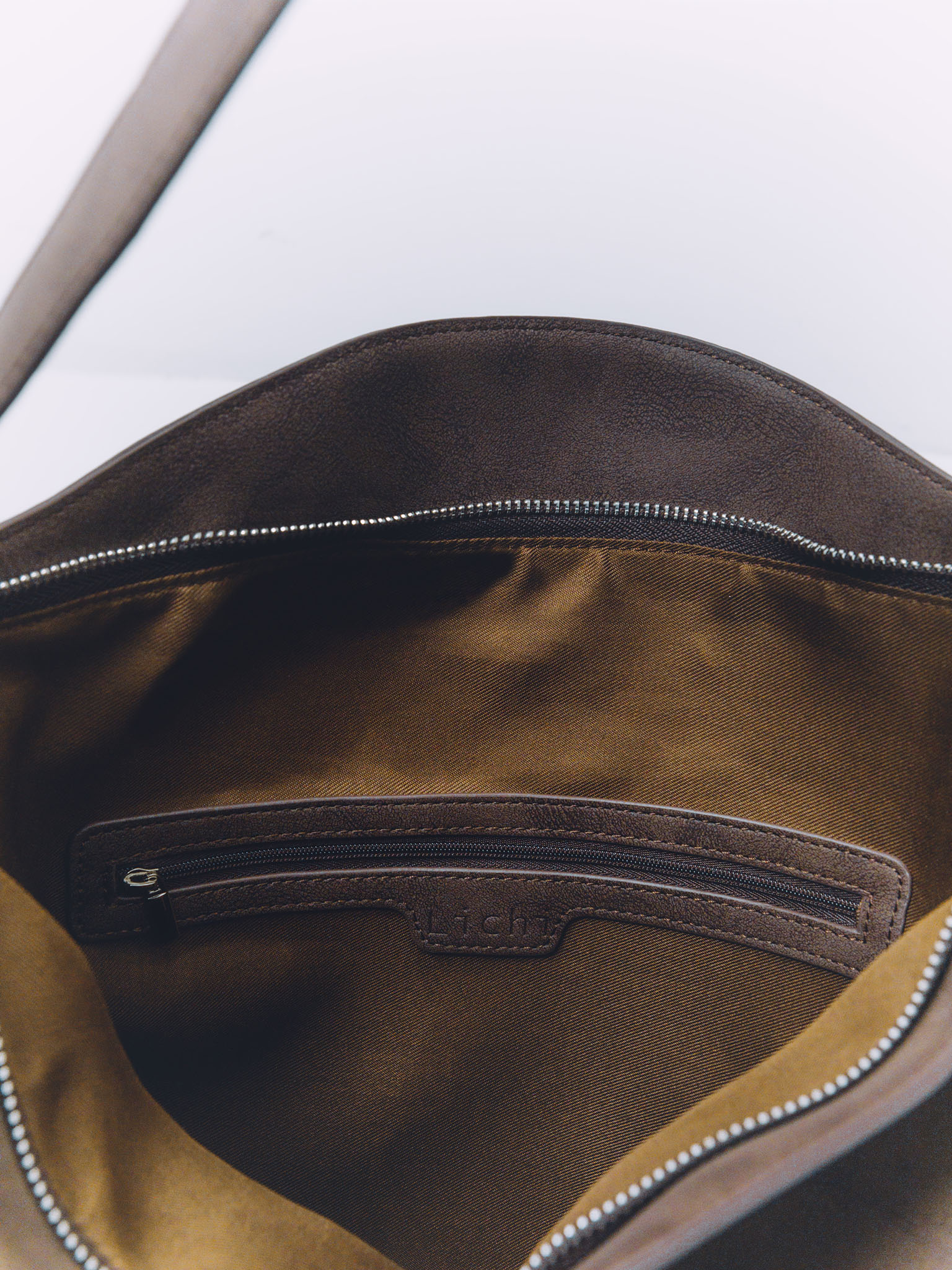 Rectangular eco-leather bag with metal decor