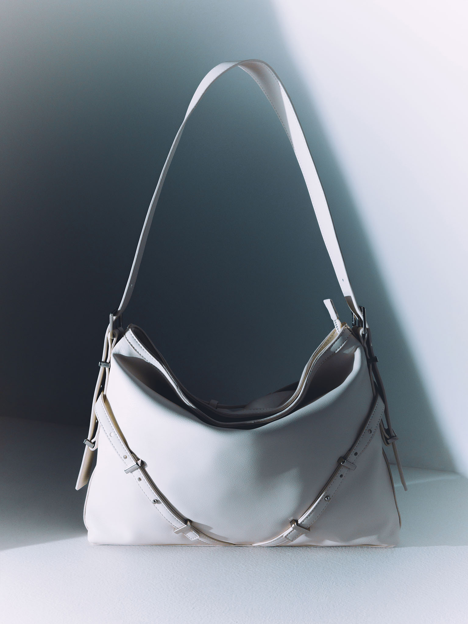 Rectangular eco-leather bag with metal decor