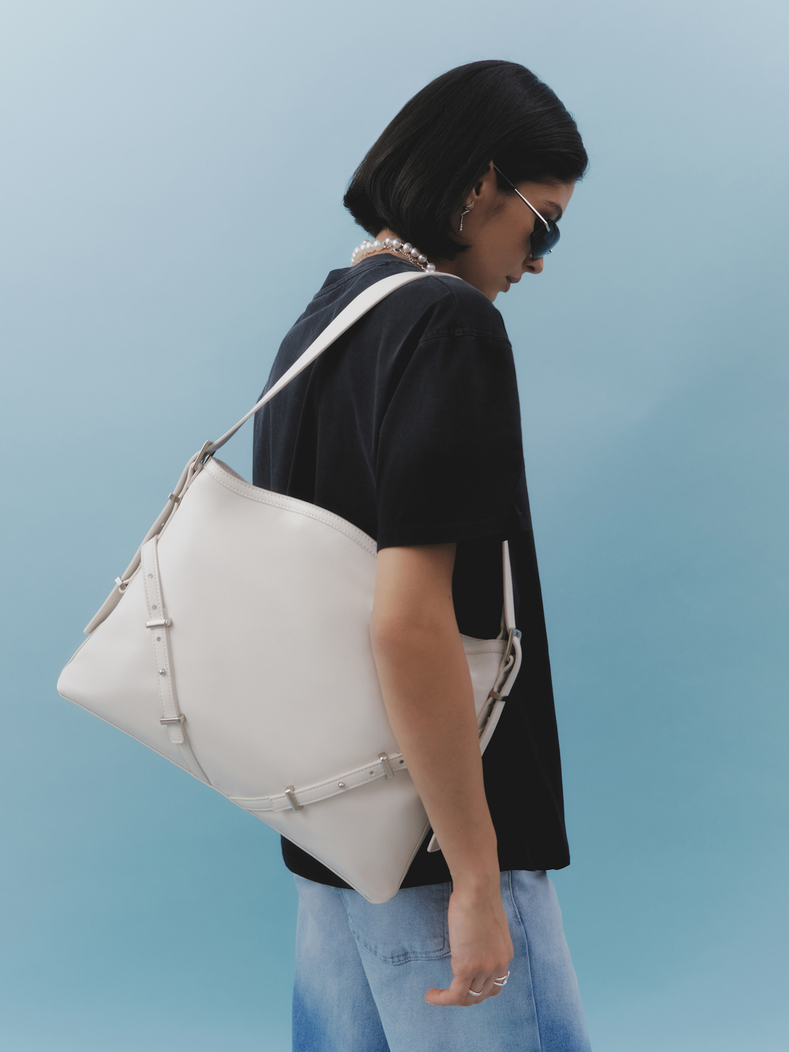 Rectangular eco-leather bag with metal decor