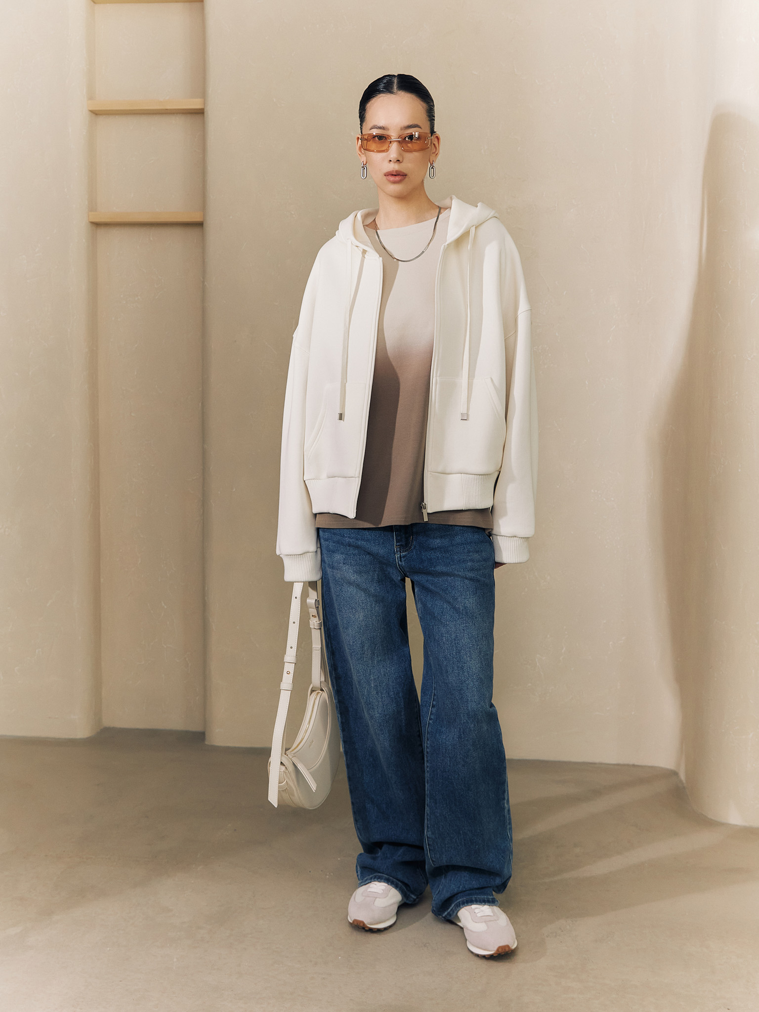 Loose mid-rise distressed jeans