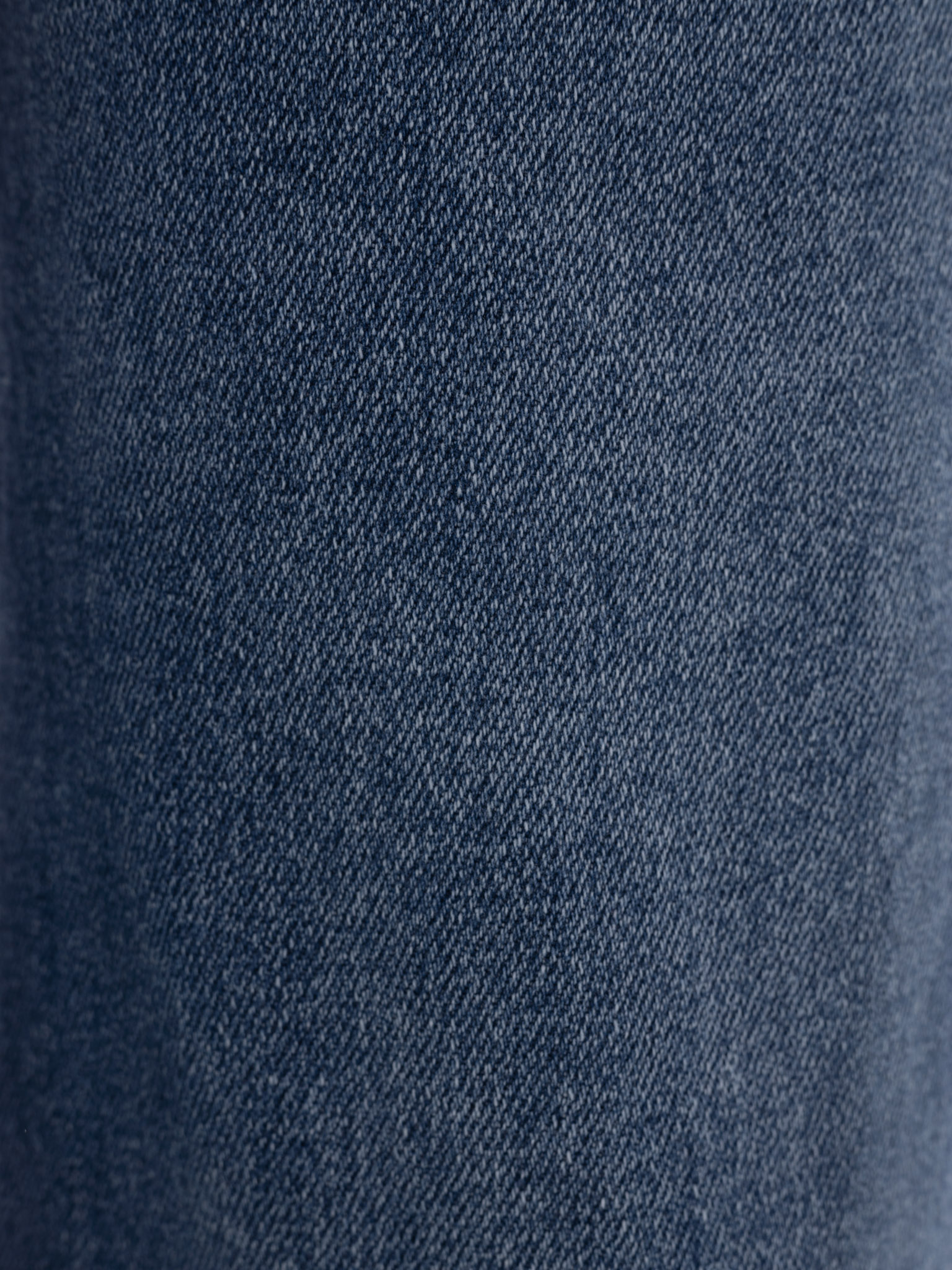 Loose mid-rise distressed jeans