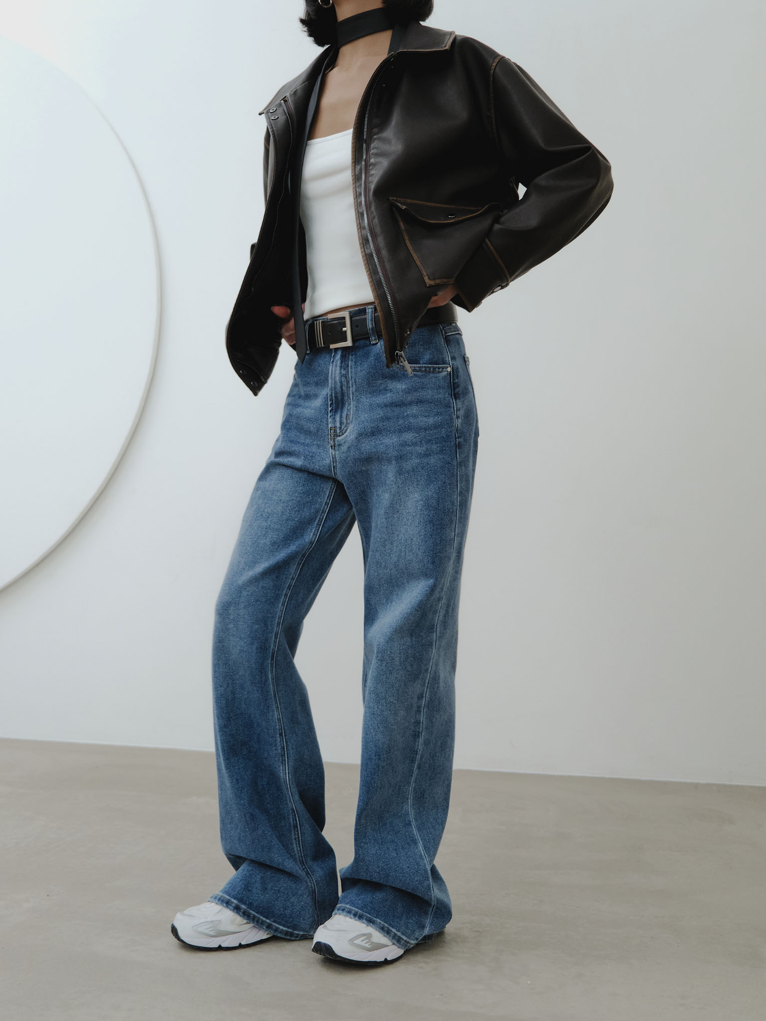 Loose mid-rise distressed jeans