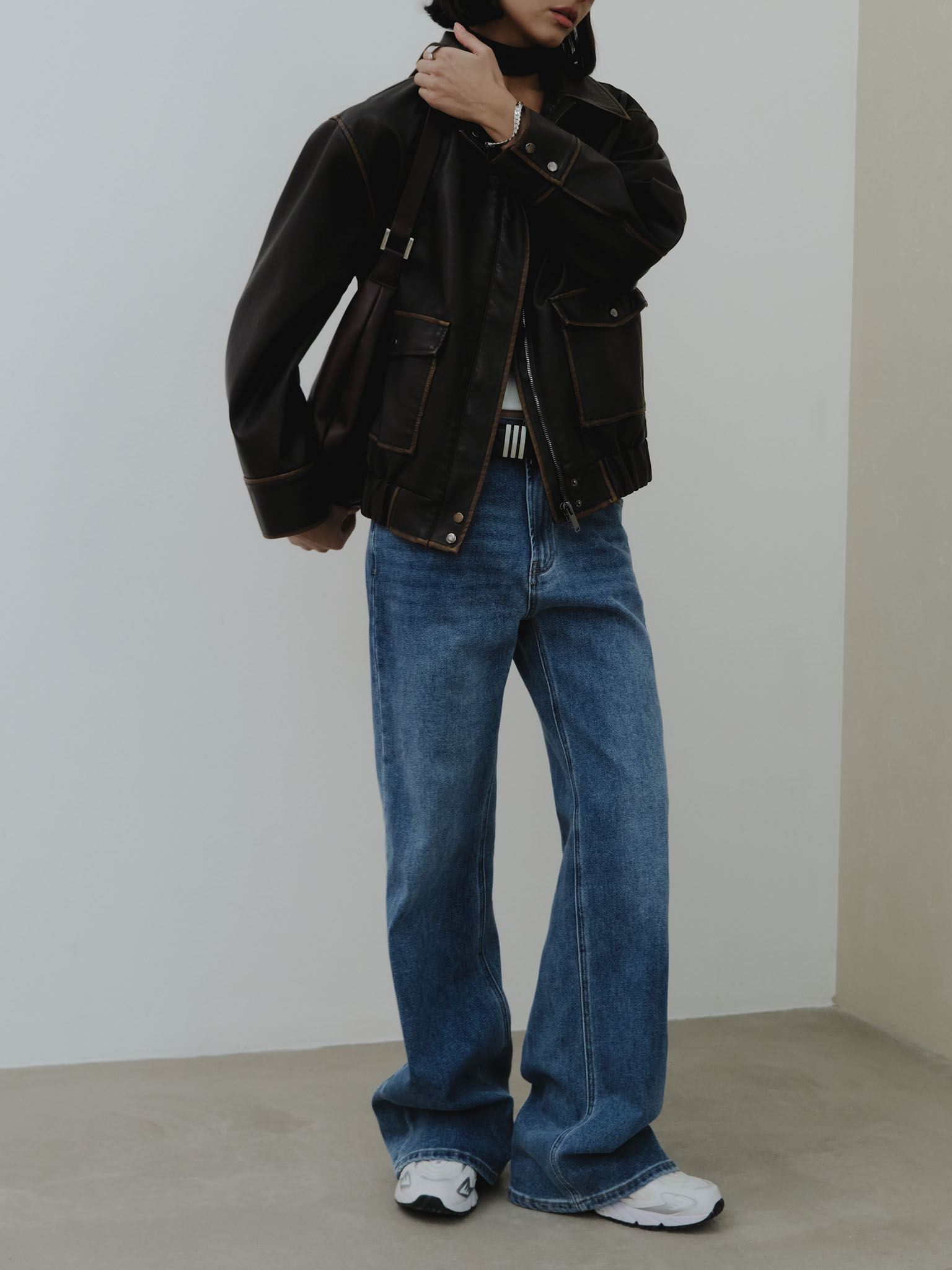 Loose mid-rise distressed jeans