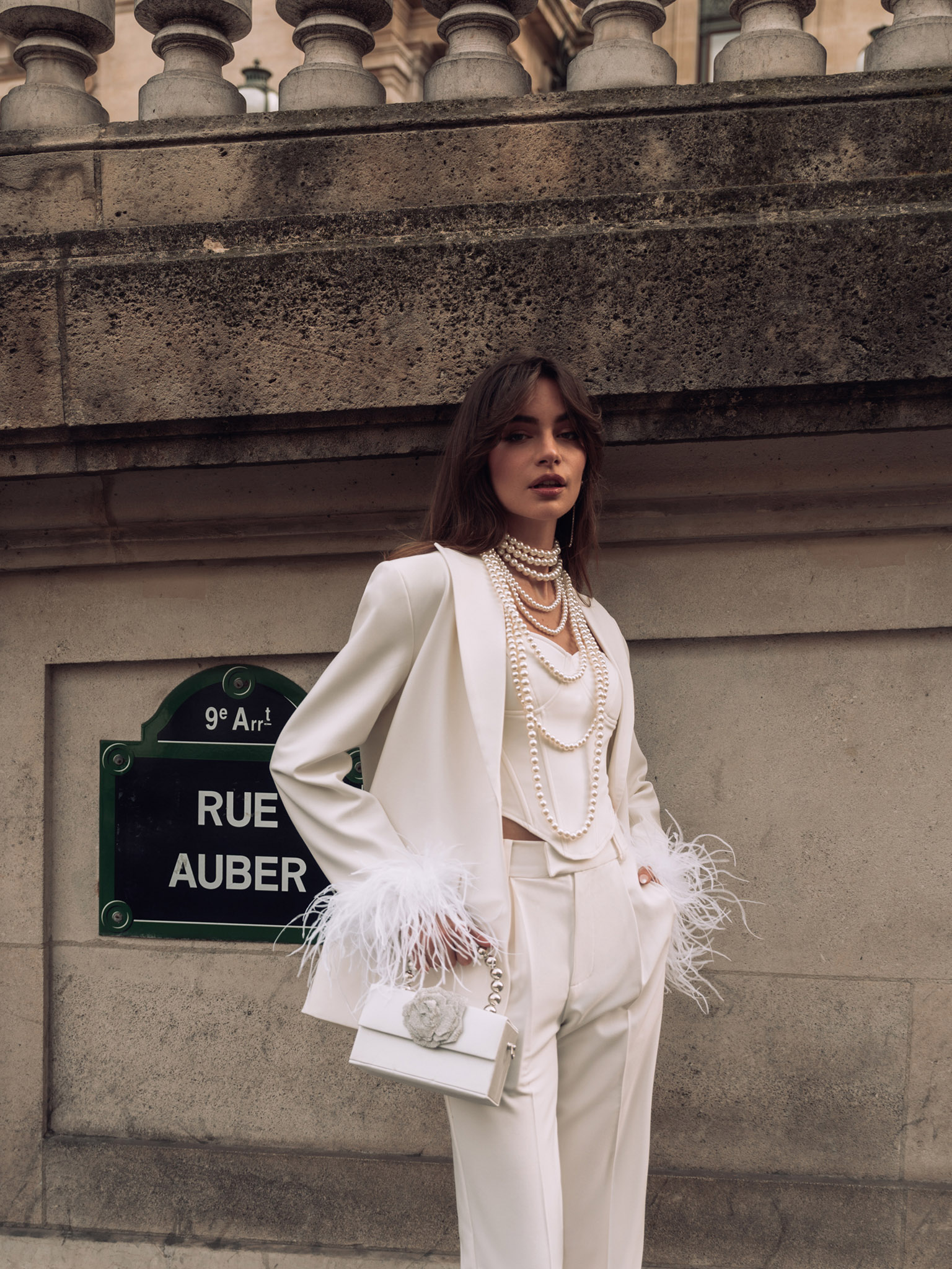 Loose trousers with waist pleats