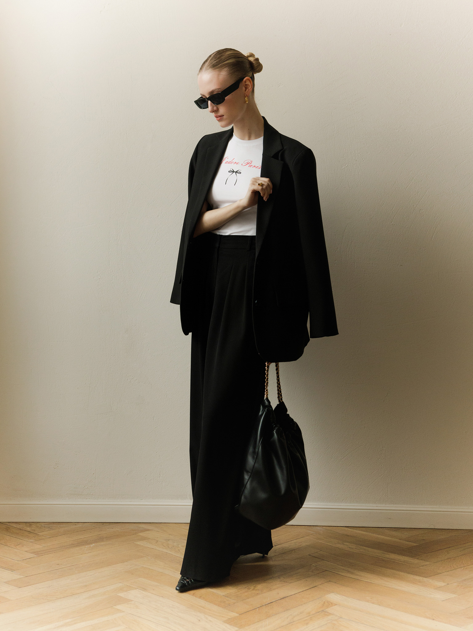 Soft-shaped bag with chain decor on the handles